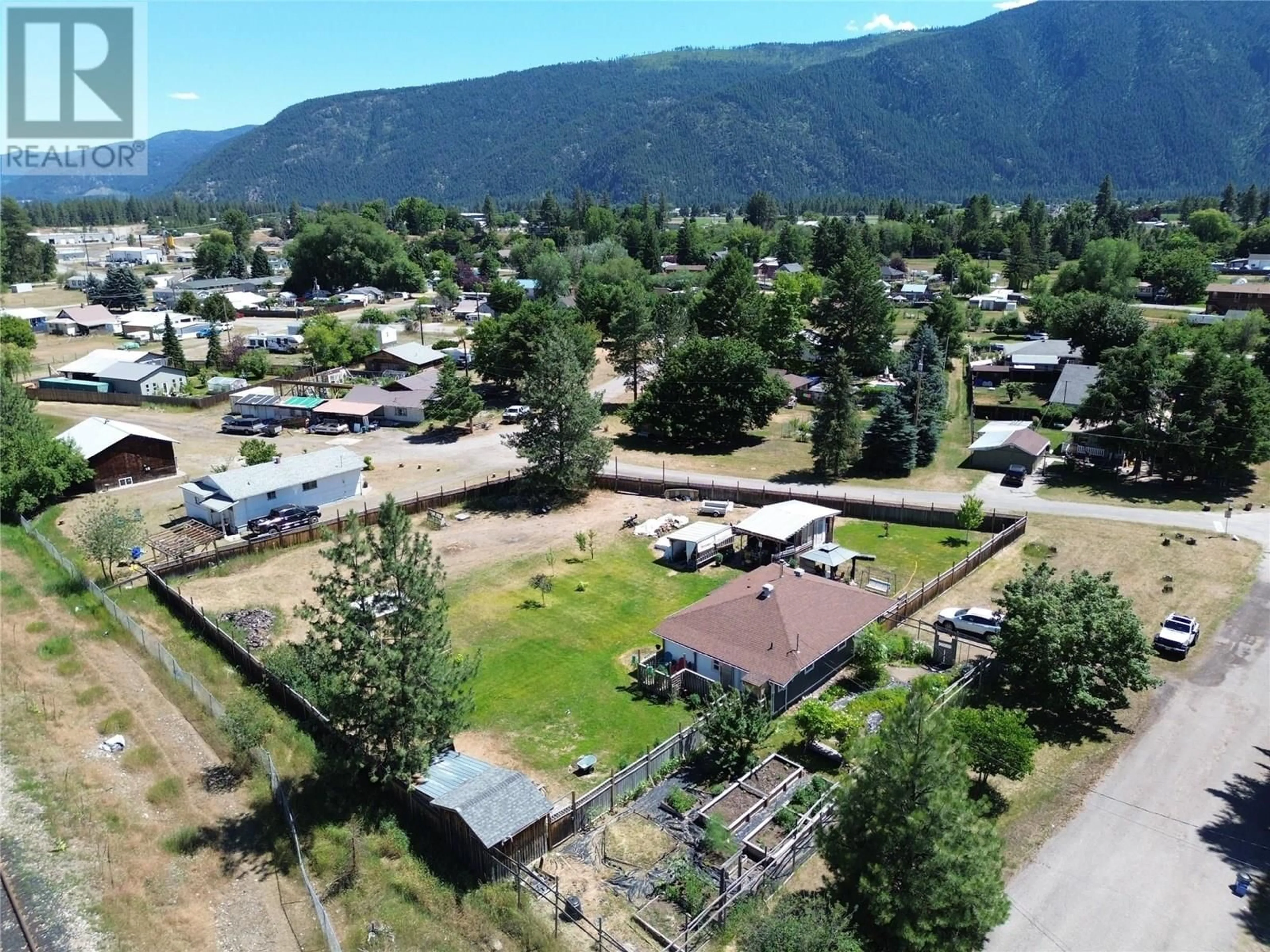 A pic from outside/outdoor area/front of a property/back of a property/a pic from drone, mountain view for 6638 COMO STREET, Grand Forks British Columbia V0H1H4