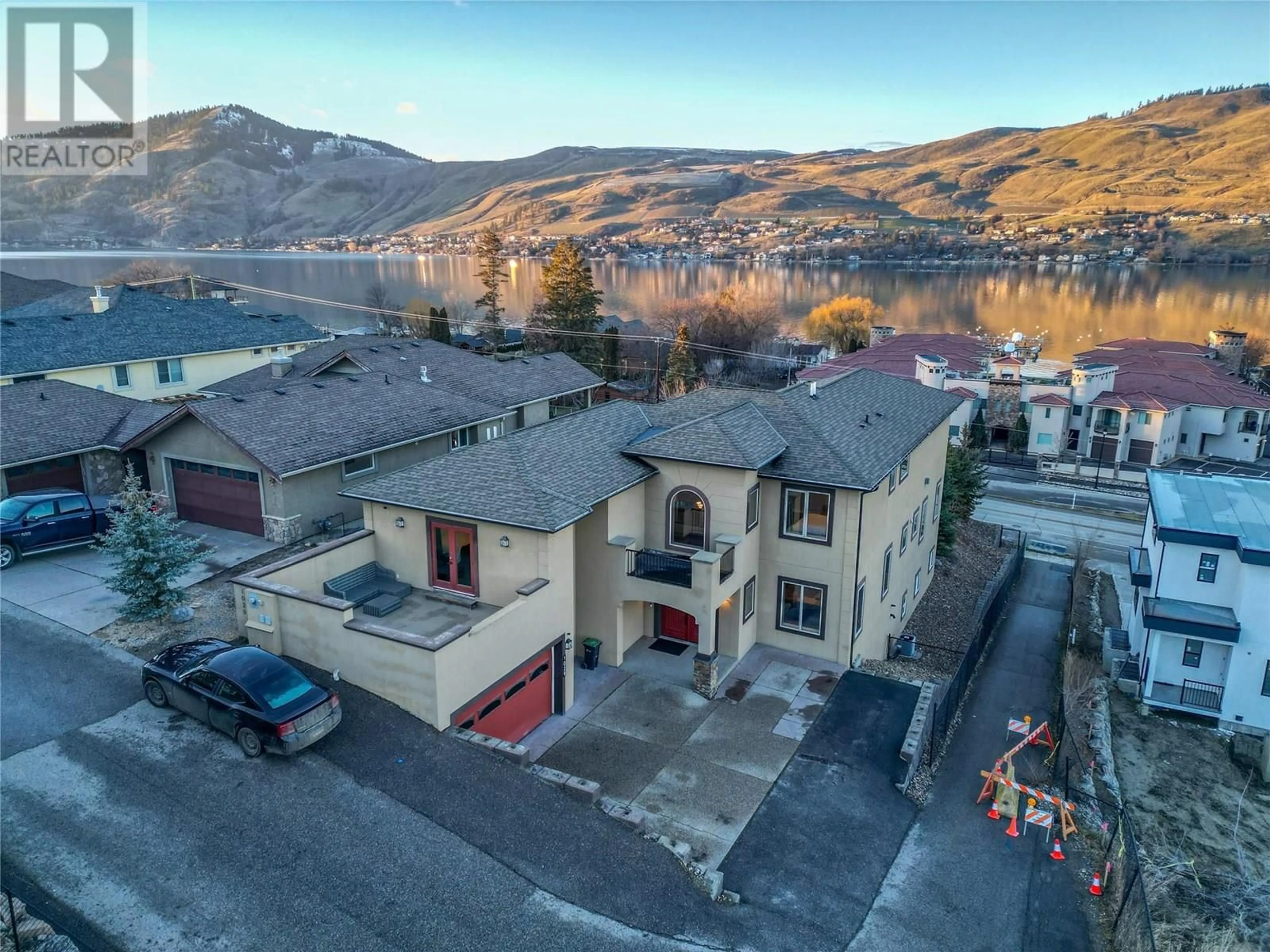 A pic from outside/outdoor area/front of a property/back of a property/a pic from drone, mountain view for 1029 LONGACRE PLACE, Vernon British Columbia V1H1H7