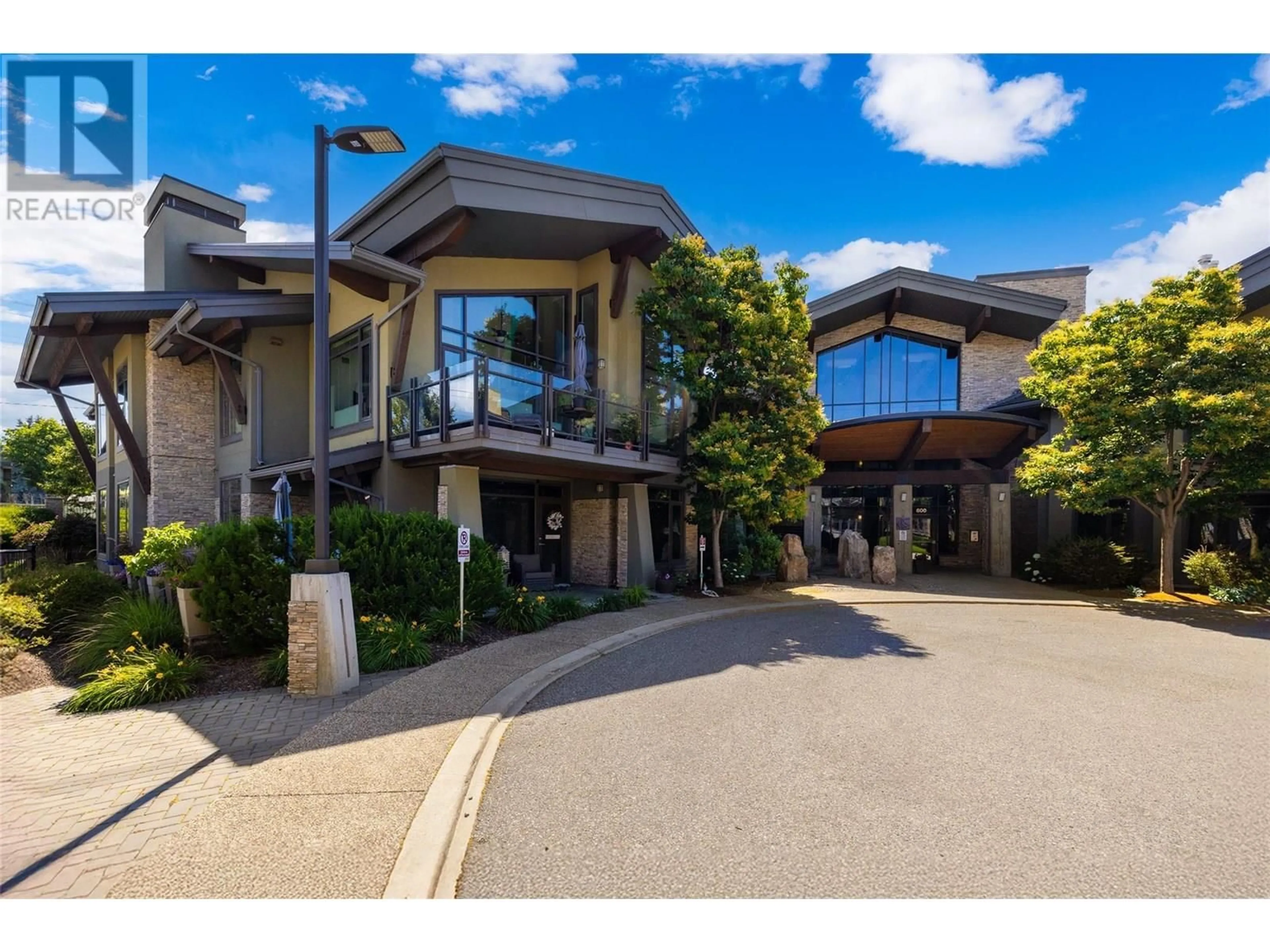 A pic from outside/outdoor area/front of a property/back of a property/a pic from drone, unknown for 205 - 600 SARSONS ROAD, Kelowna British Columbia V1W5H5