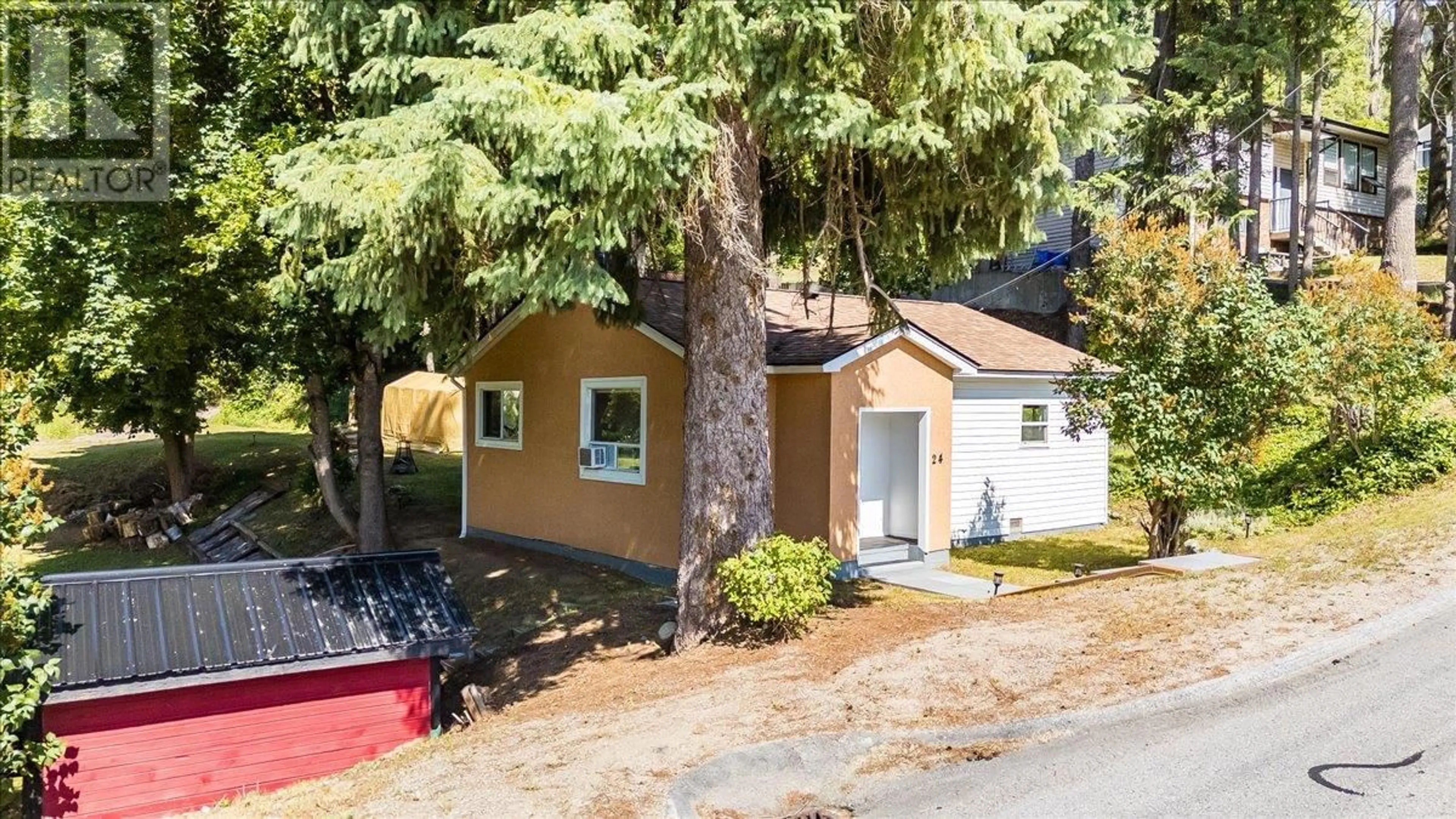 A pic from outside/outdoor area/front of a property/back of a property/a pic from drone, street for 24 MOLLER ROAD, Fruitvale British Columbia V0G1L0