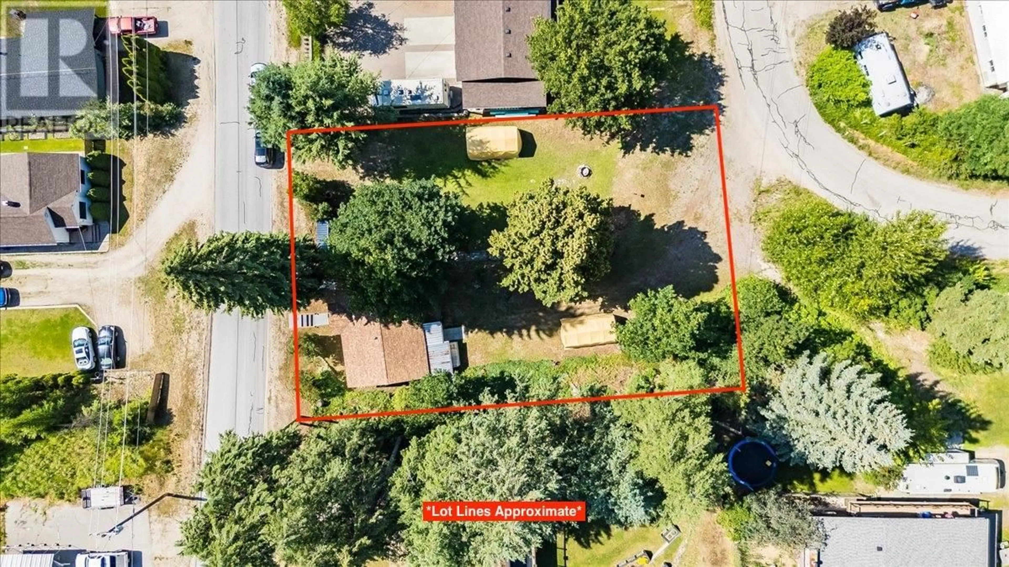 A pic from outside/outdoor area/front of a property/back of a property/a pic from drone, street for 24 MOLLER ROAD, Fruitvale British Columbia V0G1L0