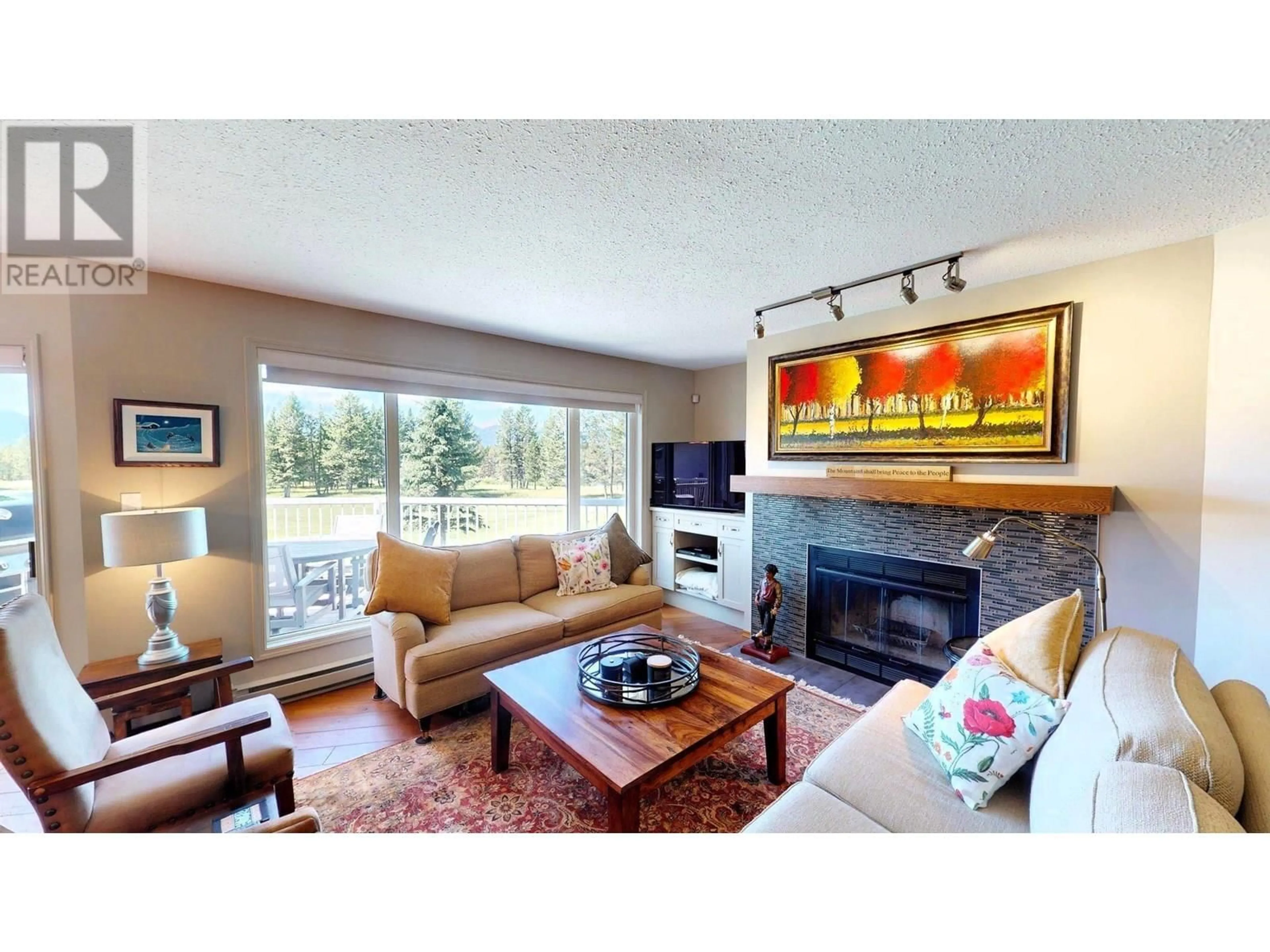 Living room with furniture, unknown for 13 - 7535 COLUMBIA AVENUE, Radium Hot Springs British Columbia V0A1M0