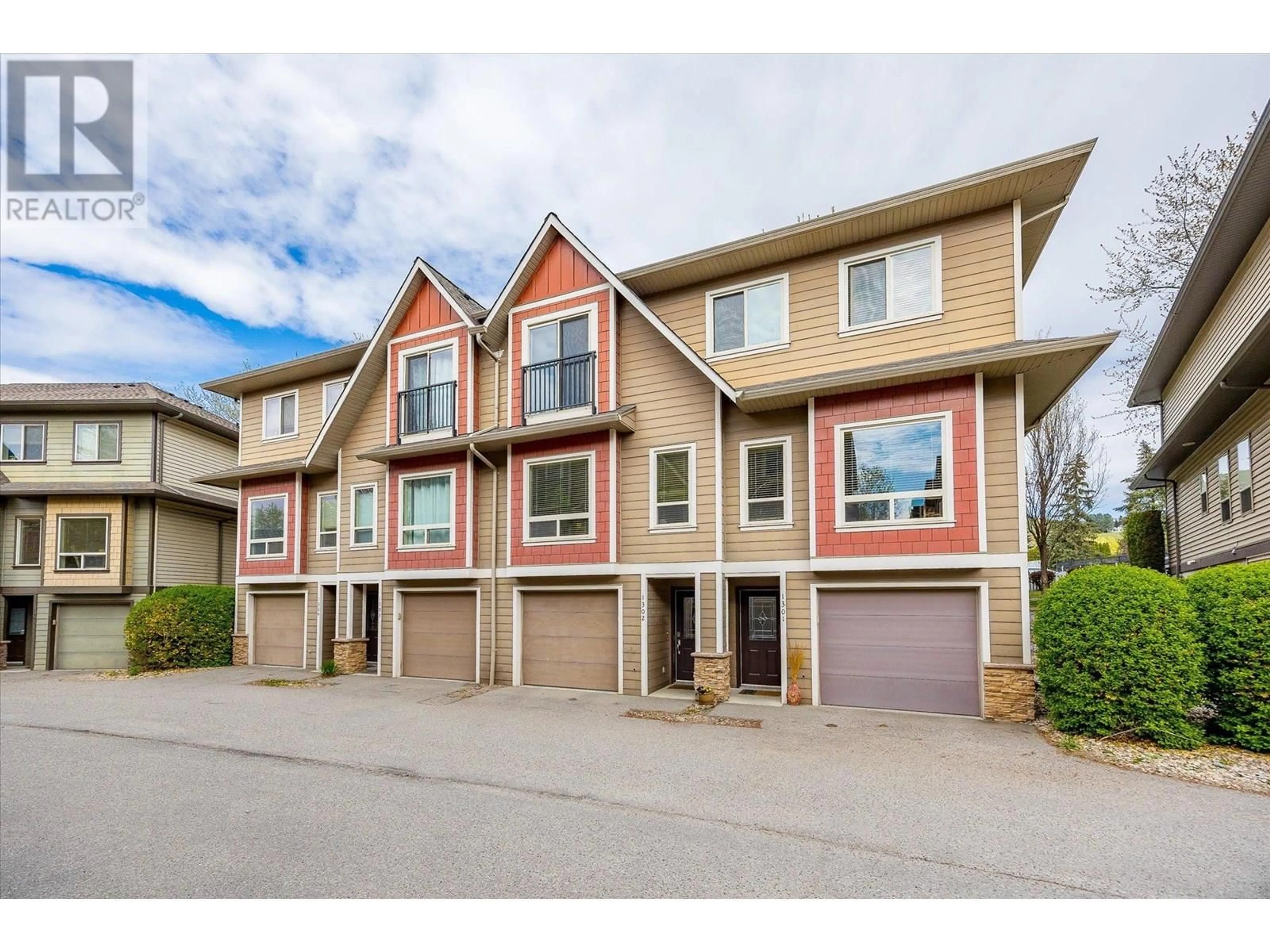 A pic from outside/outdoor area/front of a property/back of a property/a pic from drone, street for 1302 - 4900 HERITAGE DRIVE, Vernon British Columbia V1T9X1