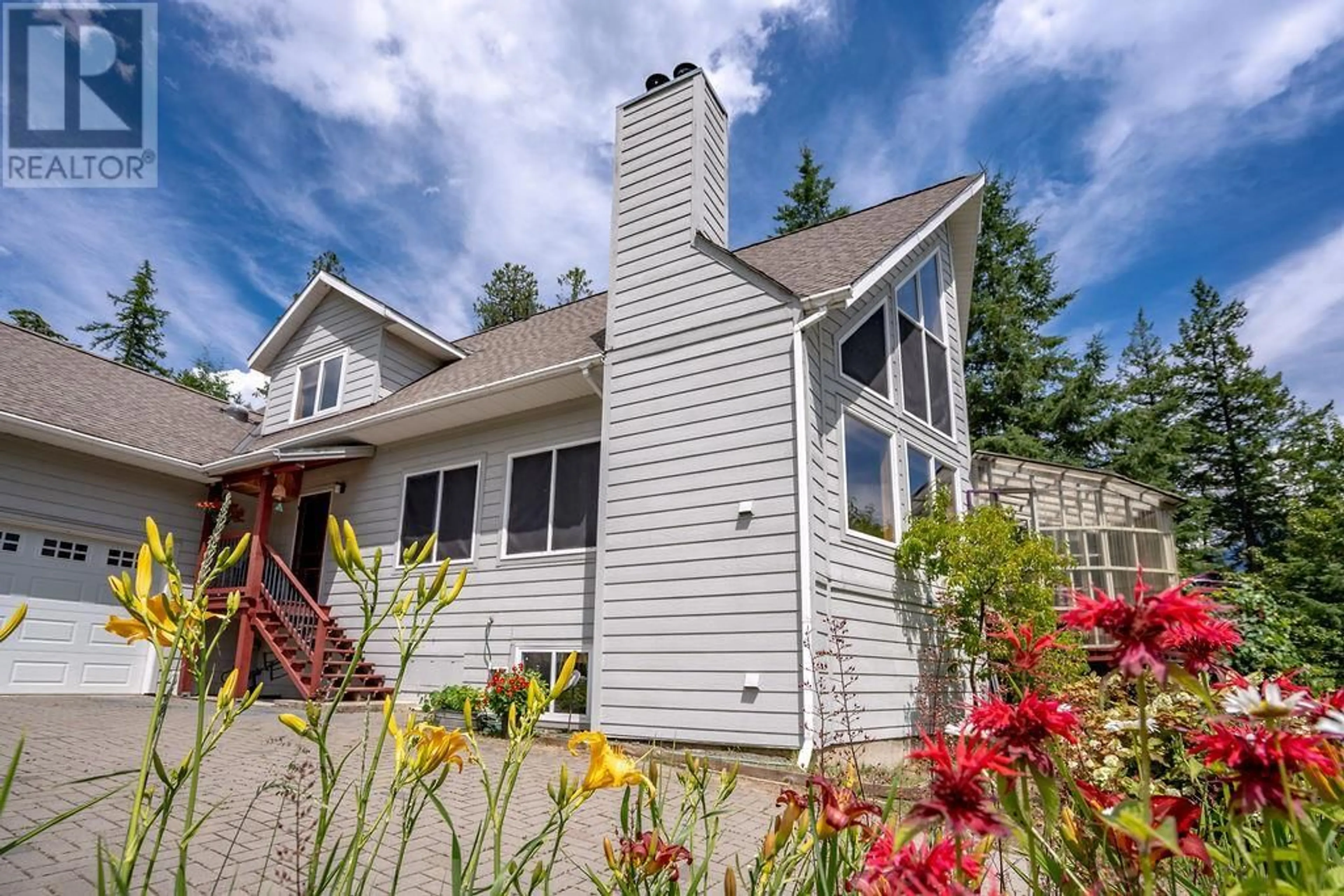 Home with vinyl exterior material, unknown for 6105 PINE RIDGE ROAD, Kaslo British Columbia V0G1M0