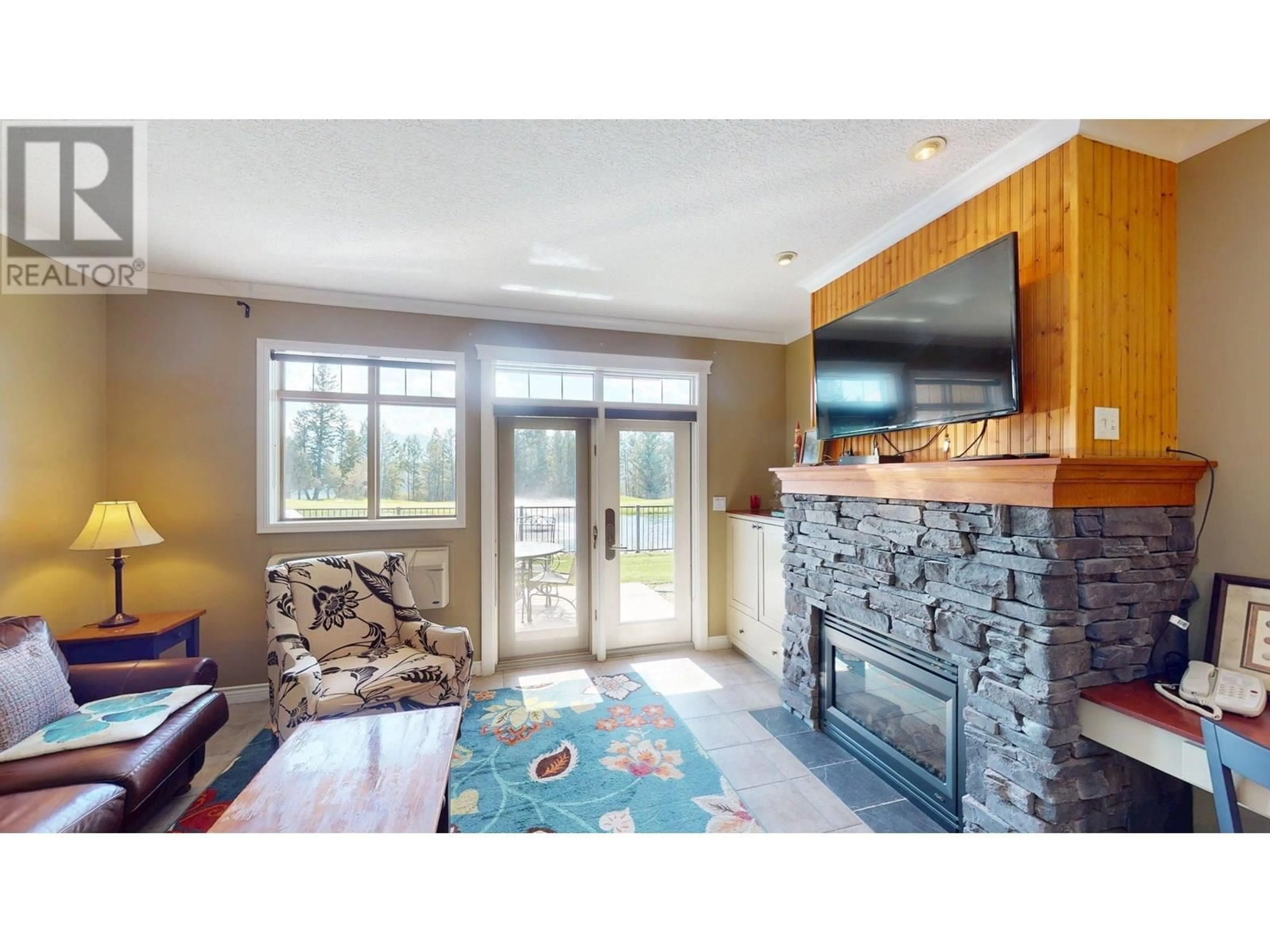 Living room with furniture, unknown for 212 - 200 BIGHORN BOULEVARD, Radium Hot Springs British Columbia V0A1M0