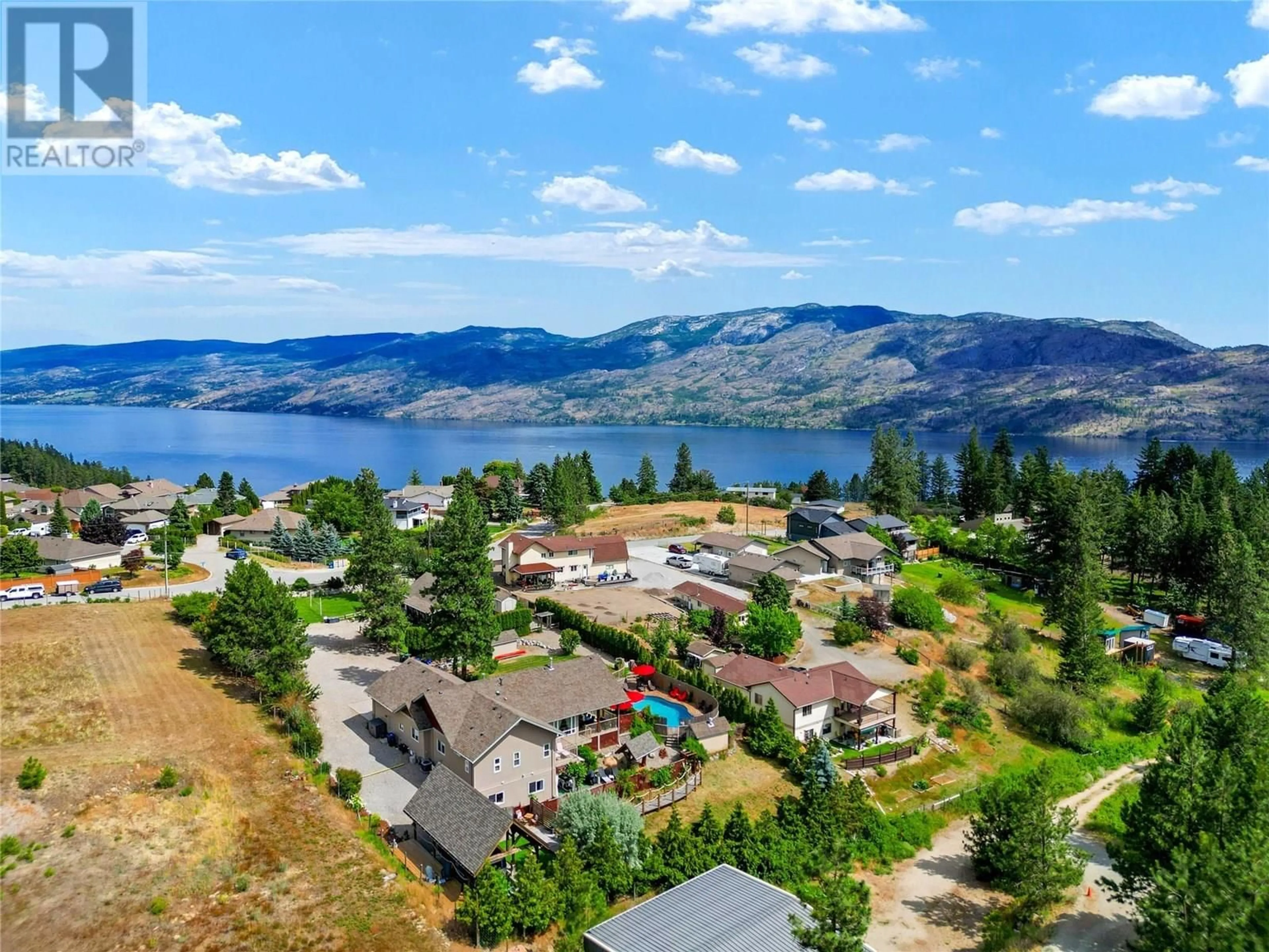 A pic from outside/outdoor area/front of a property/back of a property/a pic from drone, water/lake/river/ocean view for 5120 COUSINS ROAD, Peachland British Columbia V0H1X2