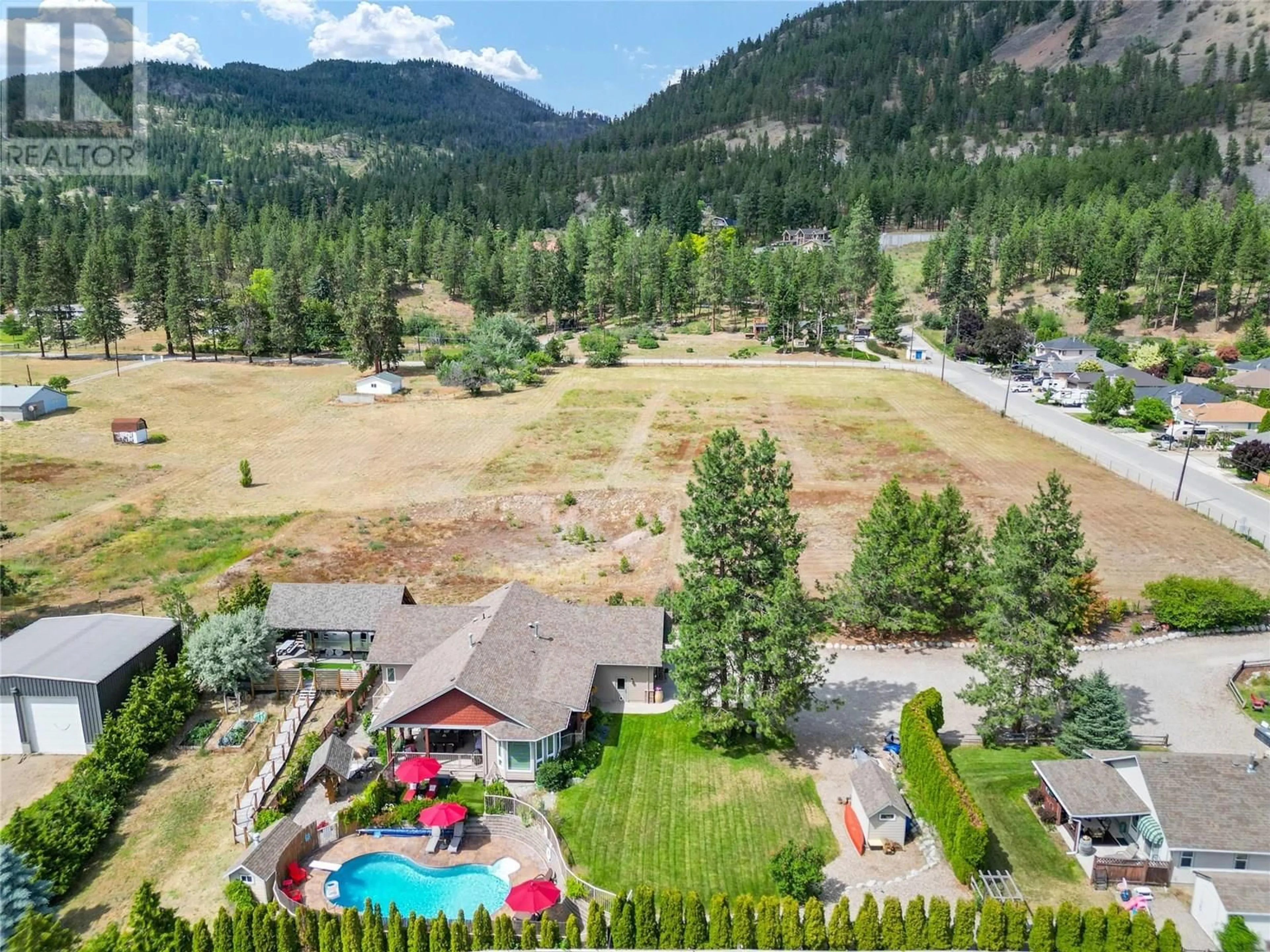 A pic from outside/outdoor area/front of a property/back of a property/a pic from drone, mountain view for 5120 COUSINS ROAD, Peachland British Columbia V0H1X2