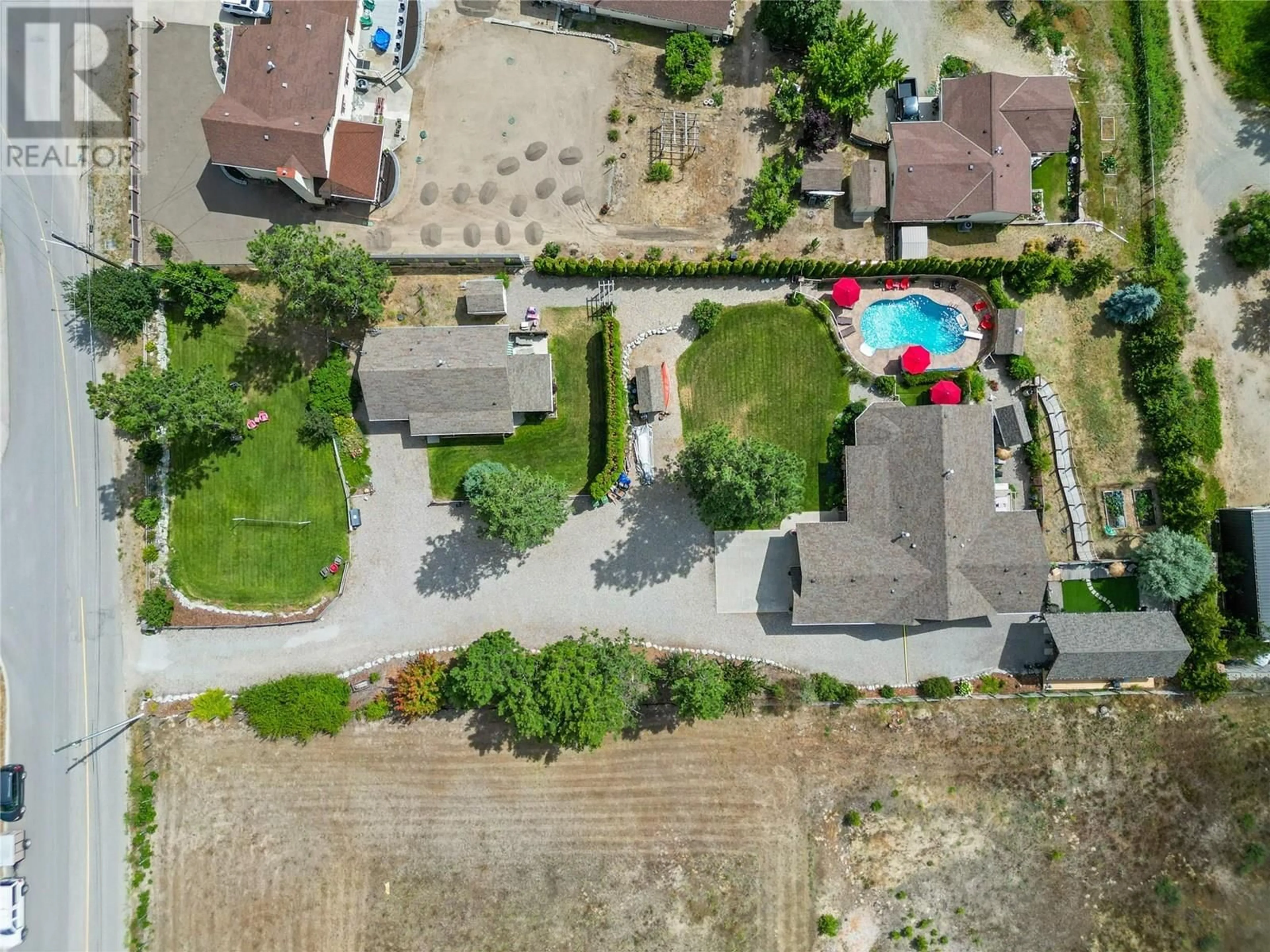 A pic from outside/outdoor area/front of a property/back of a property/a pic from drone, street for 5120 COUSINS ROAD, Peachland British Columbia V0H1X2