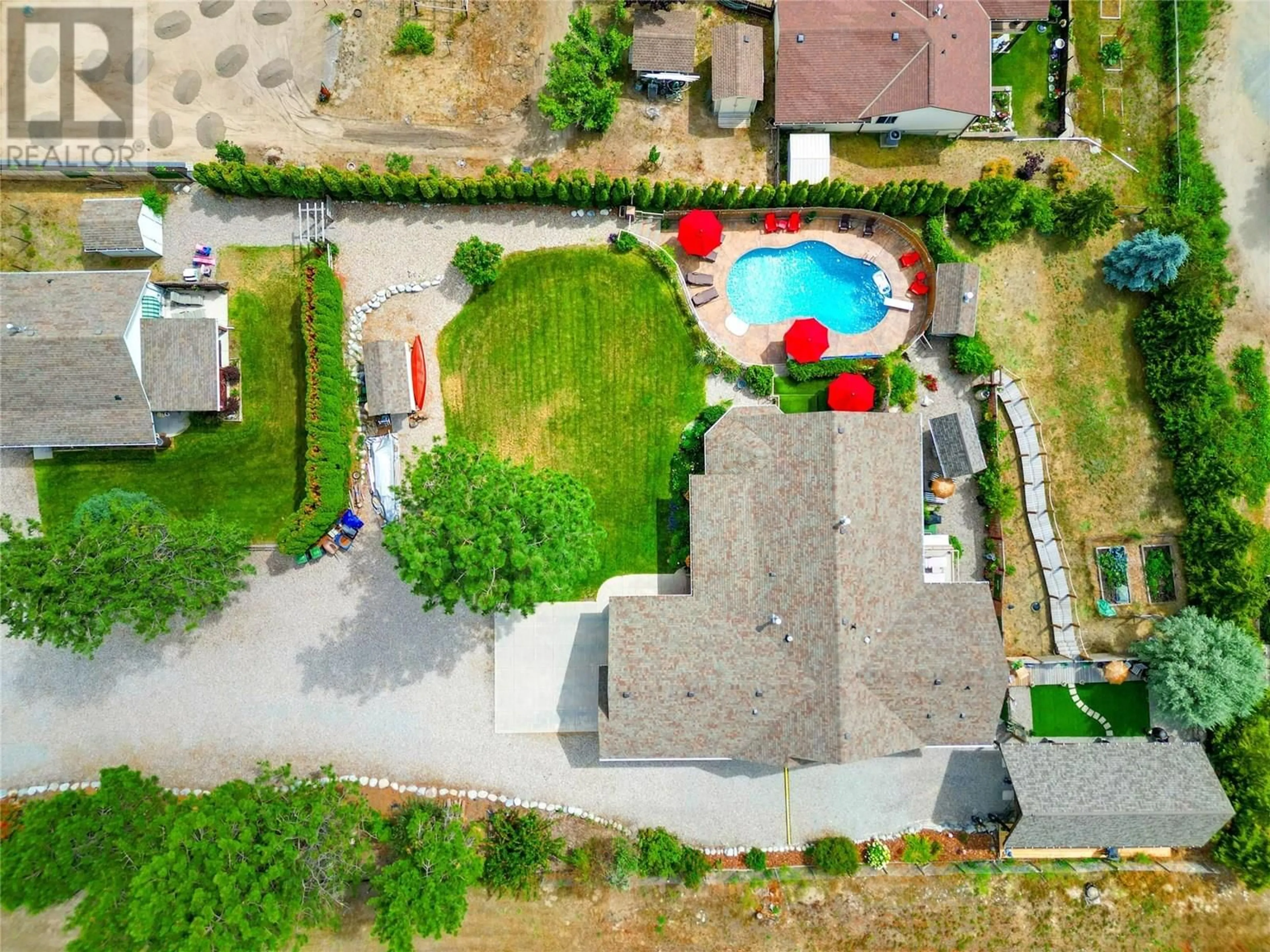 A pic from outside/outdoor area/front of a property/back of a property/a pic from drone, street for 5120 COUSINS ROAD, Peachland British Columbia V0H1X2