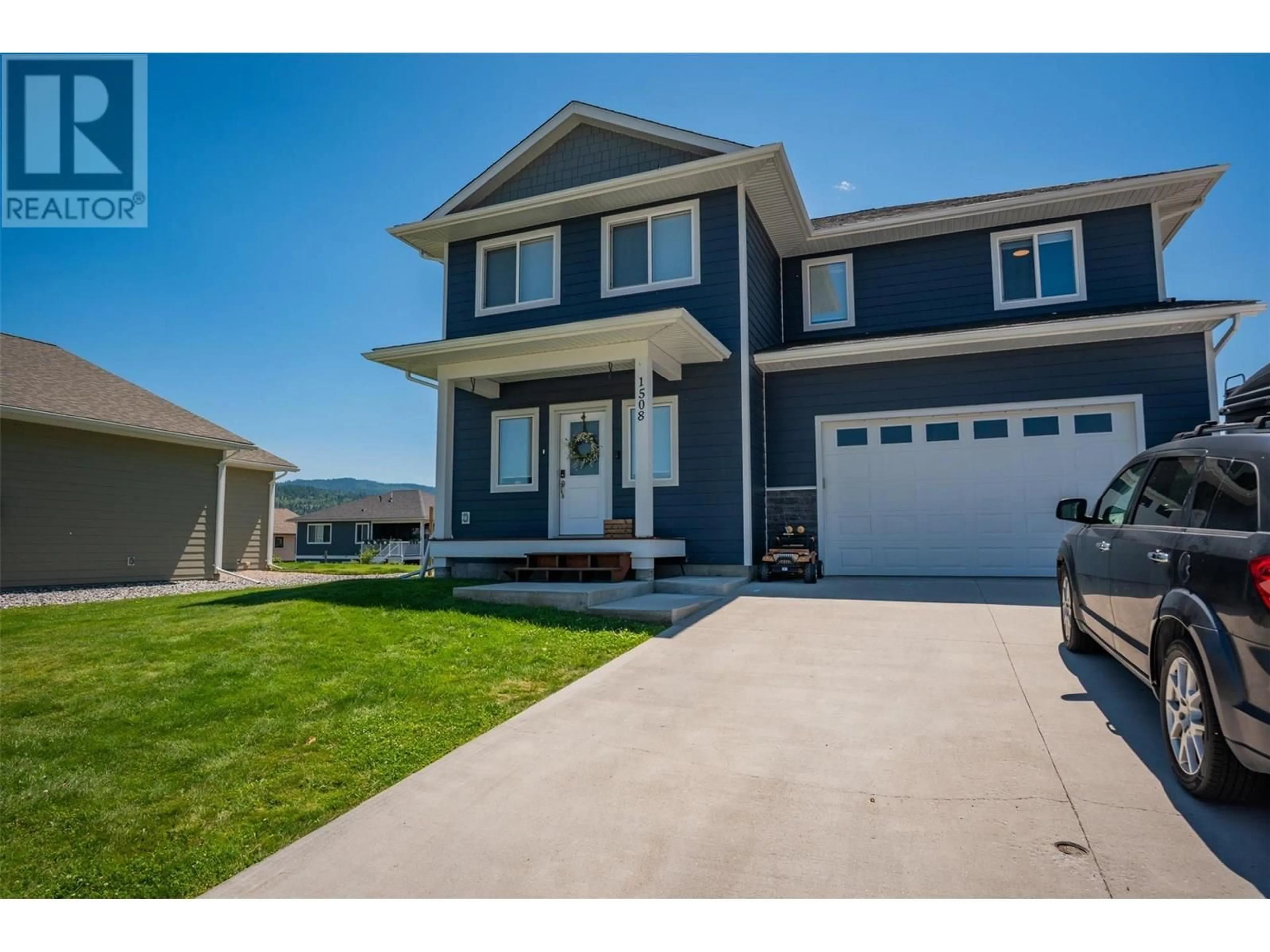 Home with vinyl exterior material, street for 1508 ASPEN LANE, Castlegar British Columbia V1N4X8