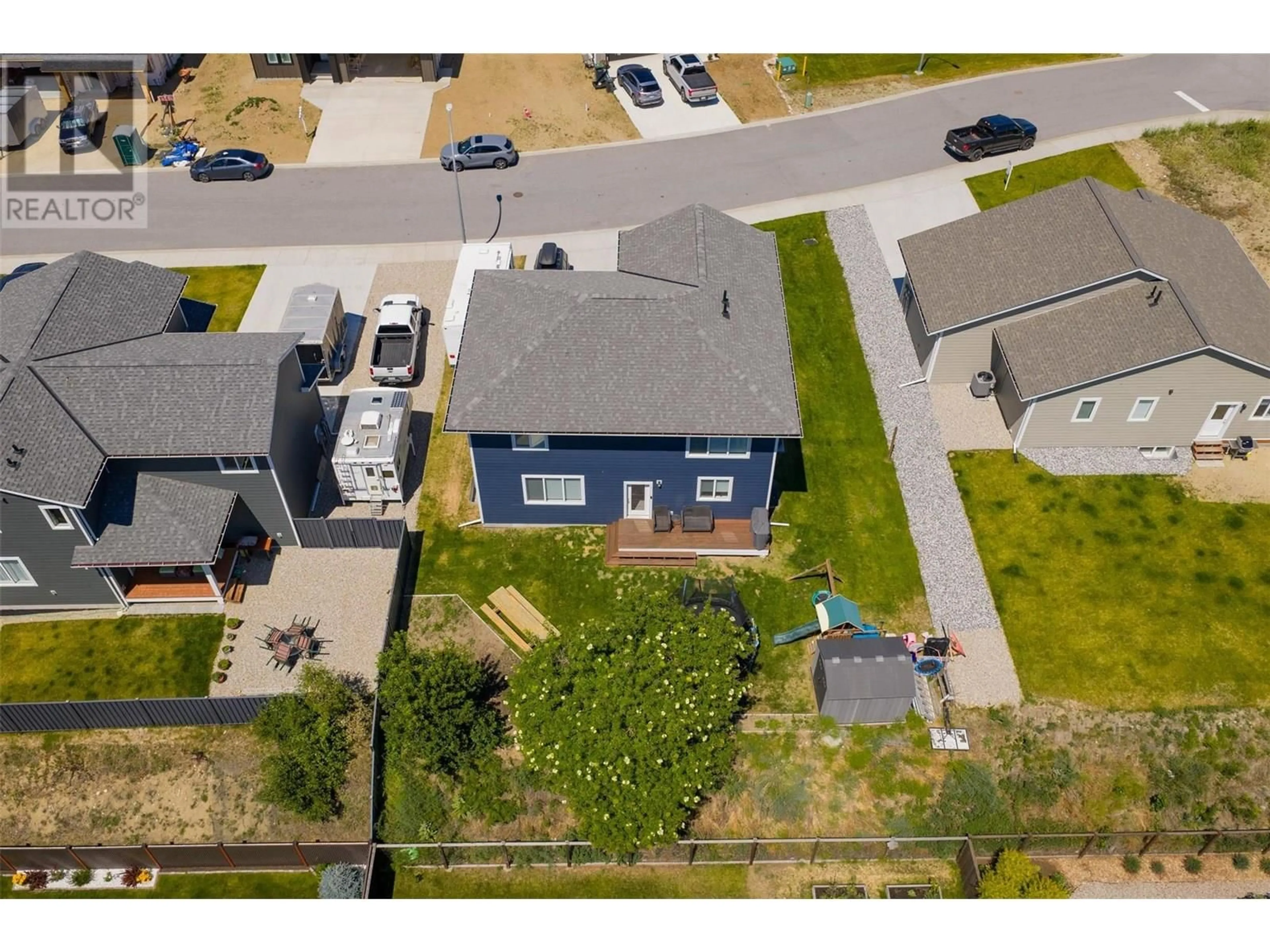 A pic from outside/outdoor area/front of a property/back of a property/a pic from drone, street for 1508 ASPEN LANE, Castlegar British Columbia V1N4X8
