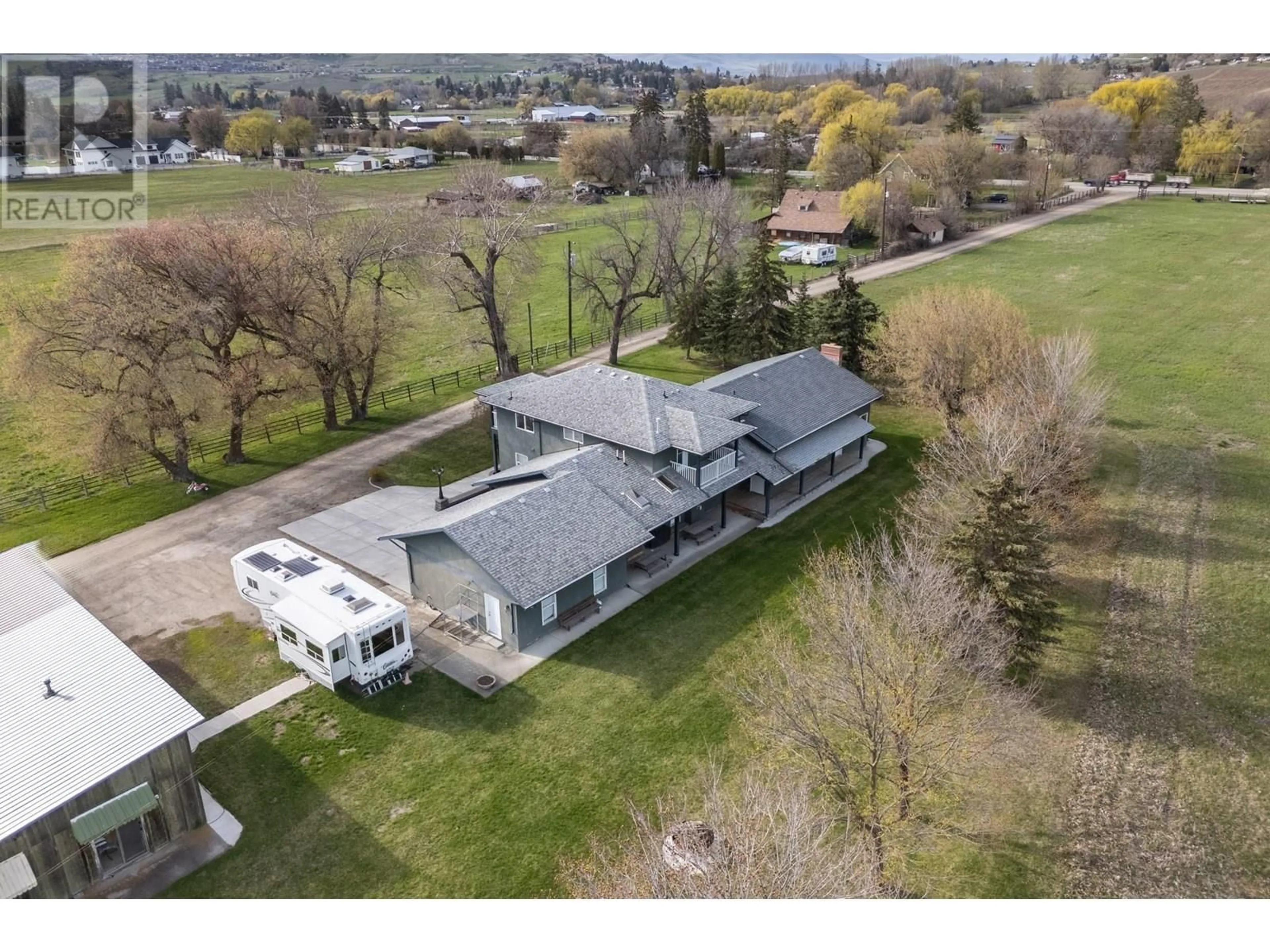 A pic from outside/outdoor area/front of a property/back of a property/a pic from drone, unknown for 9050 KALAMALKA ROAD, Coldstream British Columbia V1B3C3