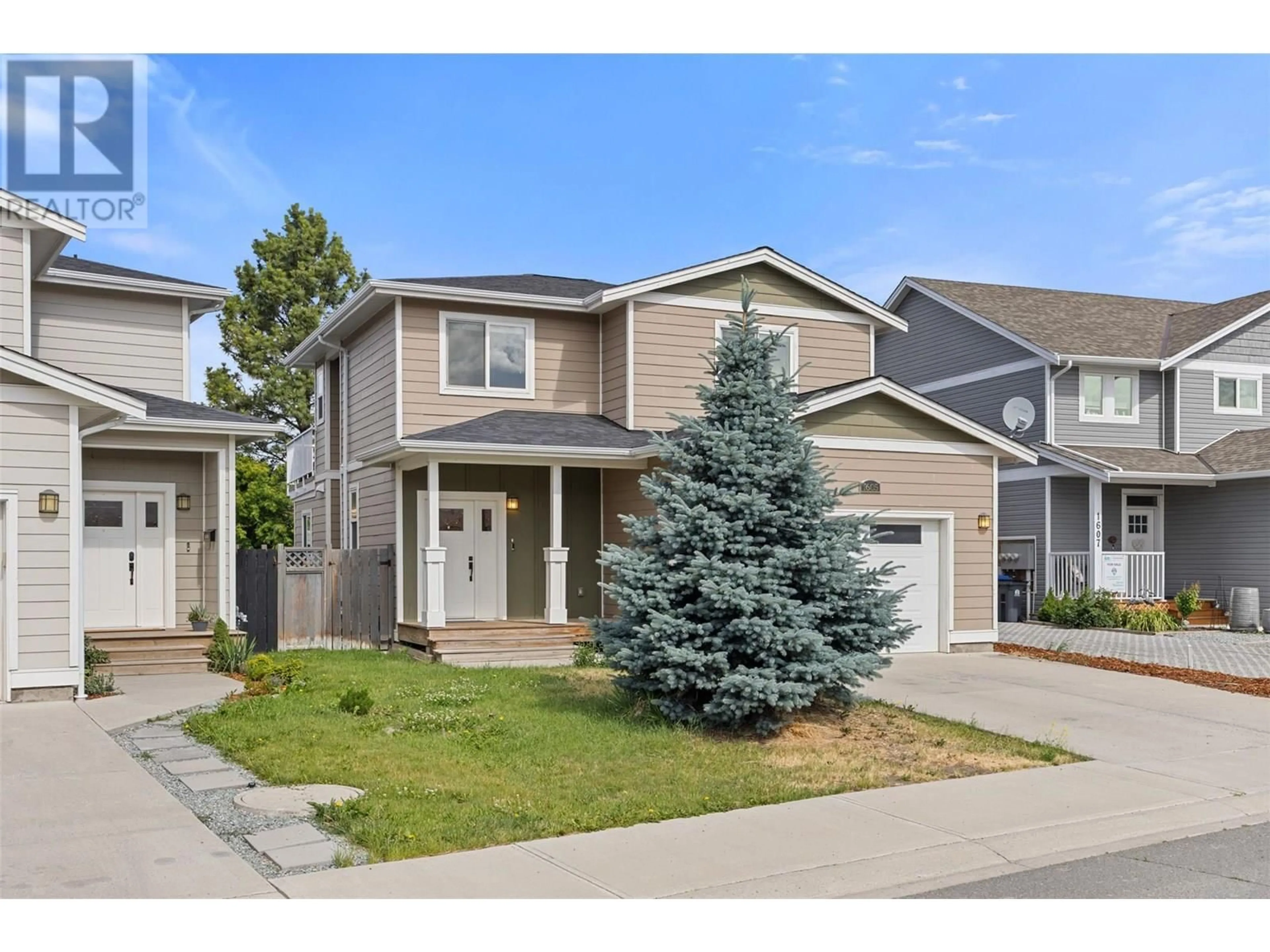 Home with vinyl exterior material, street for 1605 PHILLIPS STREET, Merritt British Columbia V1K0B8