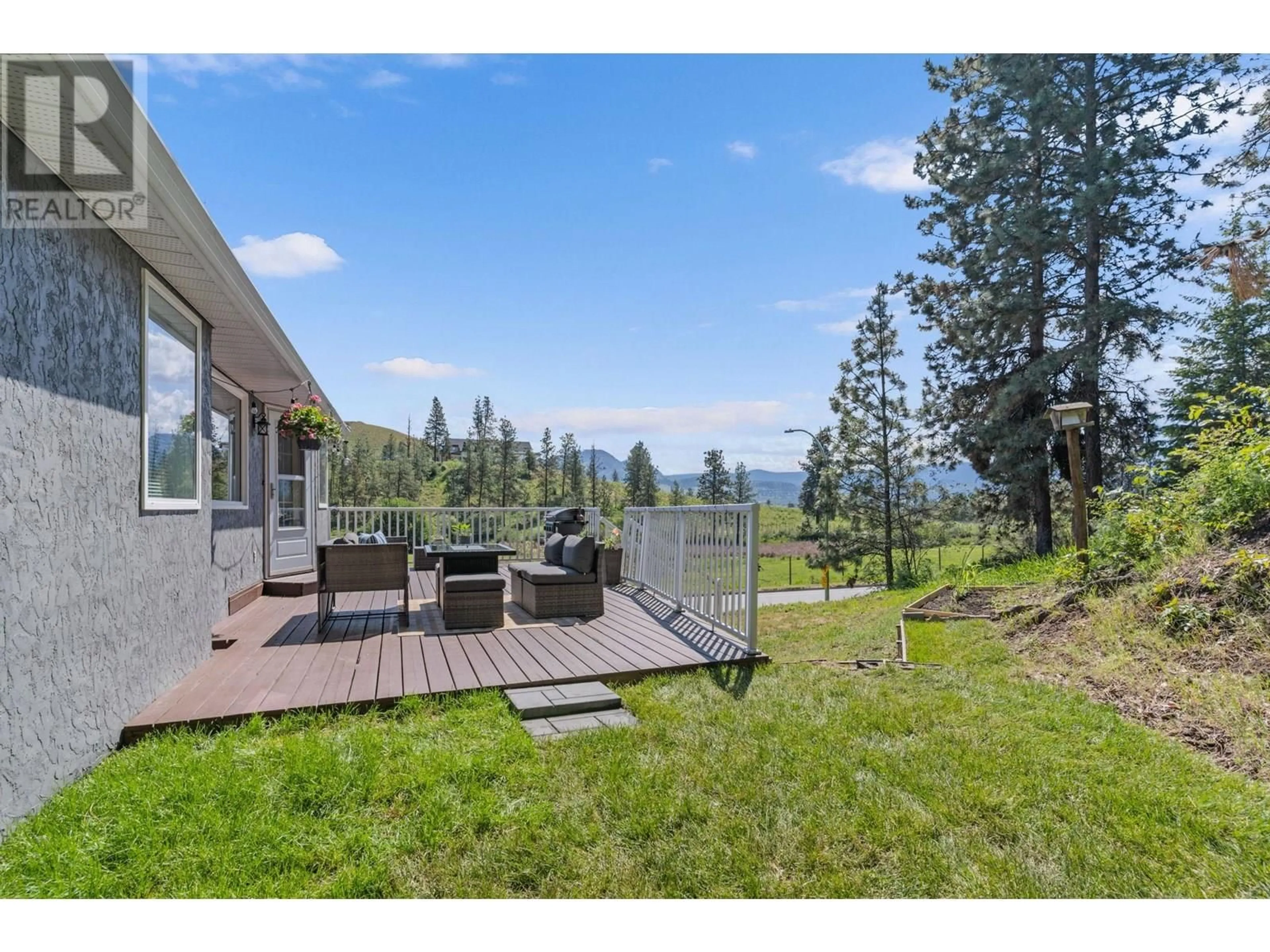 A pic from outside/outdoor area/front of a property/back of a property/a pic from drone, mountain view for 2455 SILVER PLACE, Kelowna British Columbia V1V1M9
