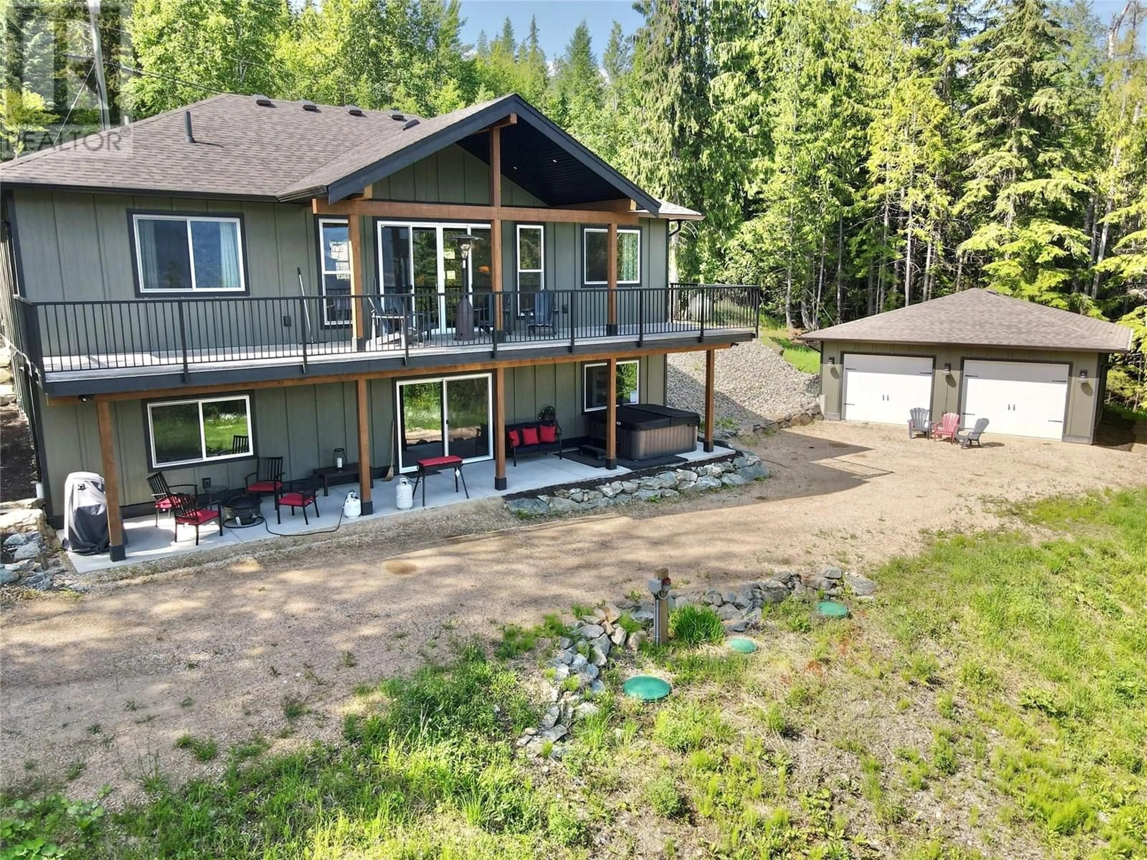 A pic from outside/outdoor area/front of a property/back of a property/a pic from drone, water/lake/river/ocean view for 4959 IVY ROAD, Eagle Bay British Columbia V0E1T0
