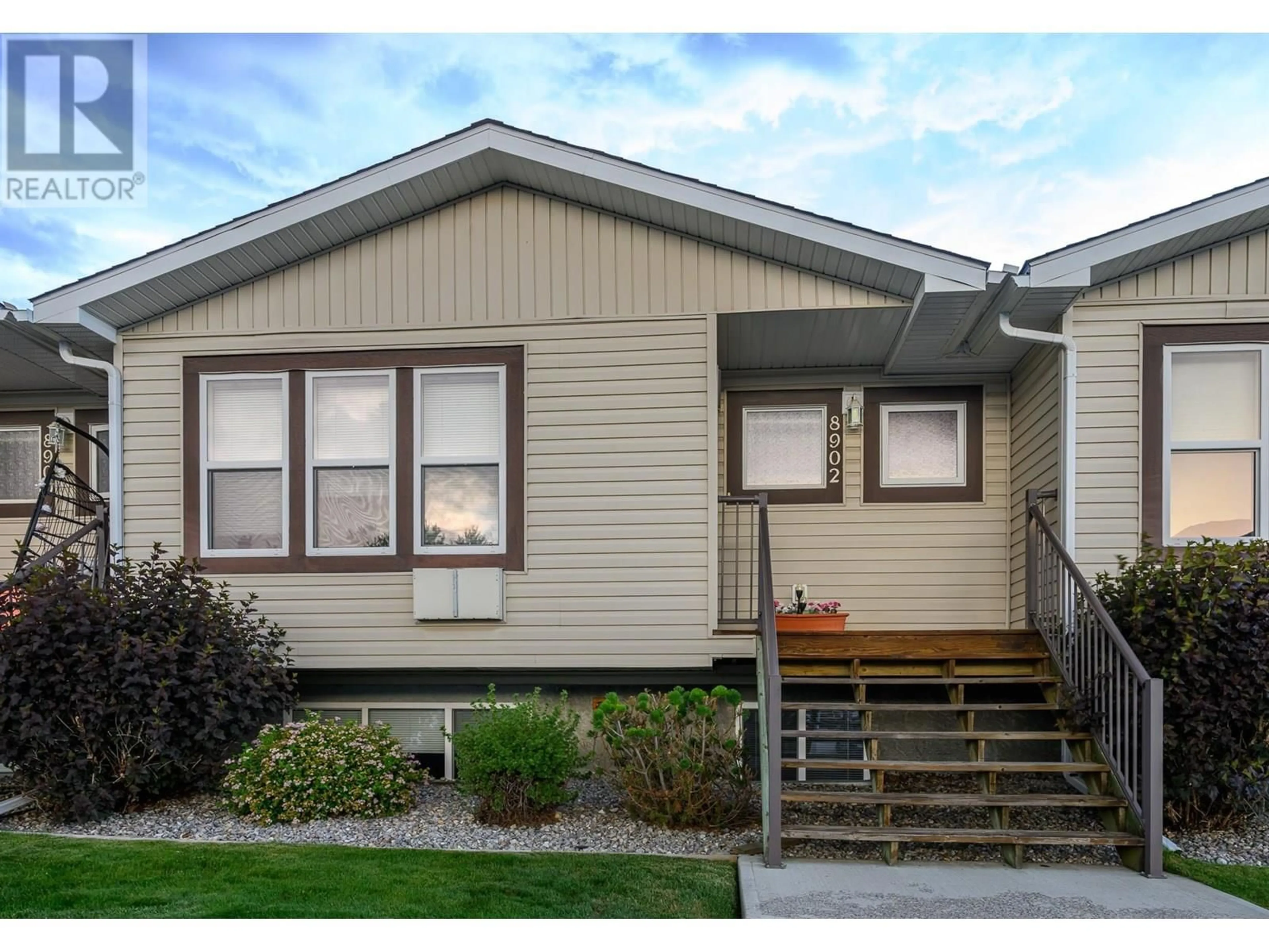 Home with vinyl exterior material, street for 8902 DOHERTY STREET, Canal Flats British Columbia V0B1B0