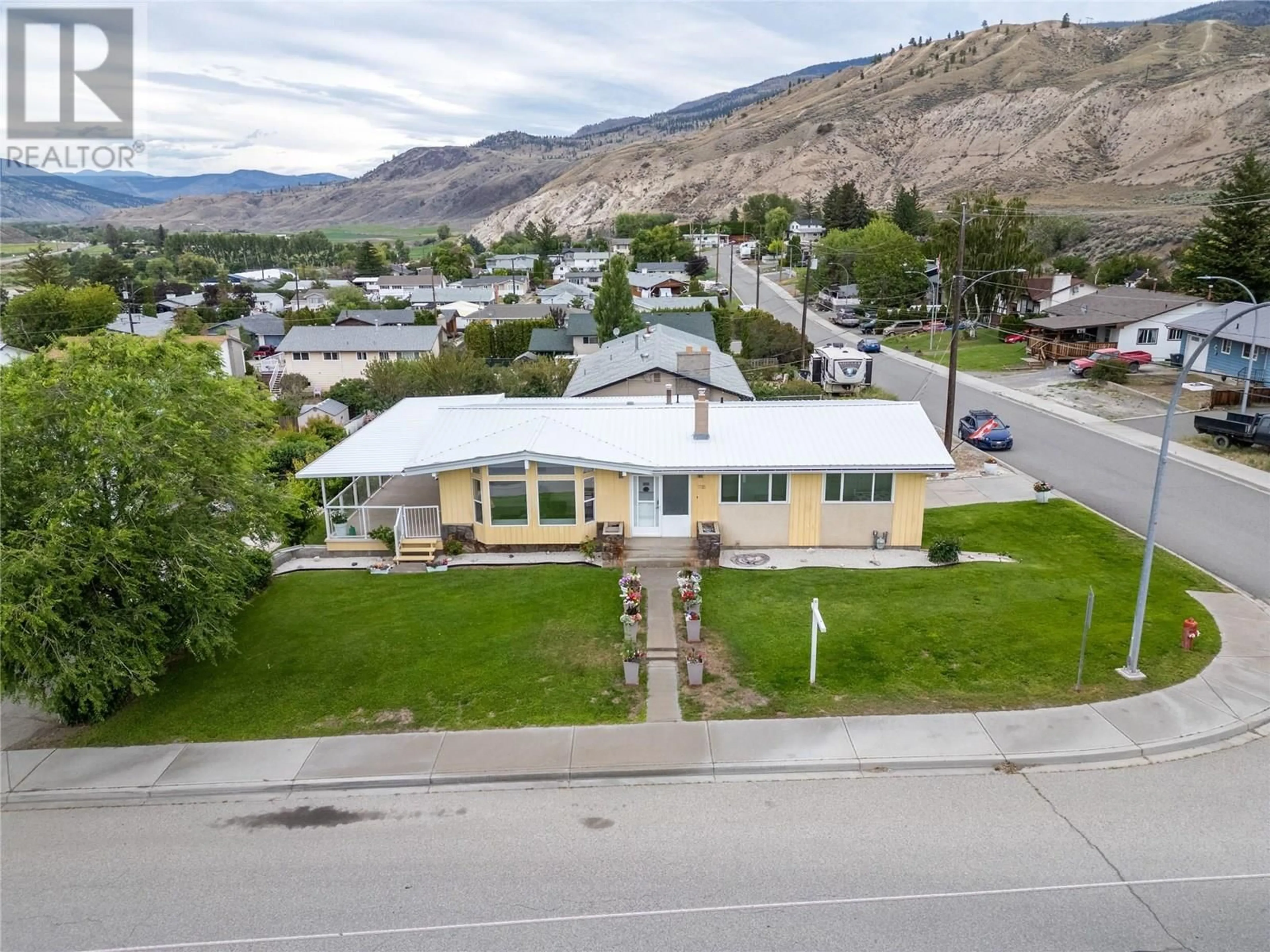 A pic from outside/outdoor area/front of a property/back of a property/a pic from drone, mountain view for 1118 MACLEAN CRESCENT, Cache Creek British Columbia V0K1H0