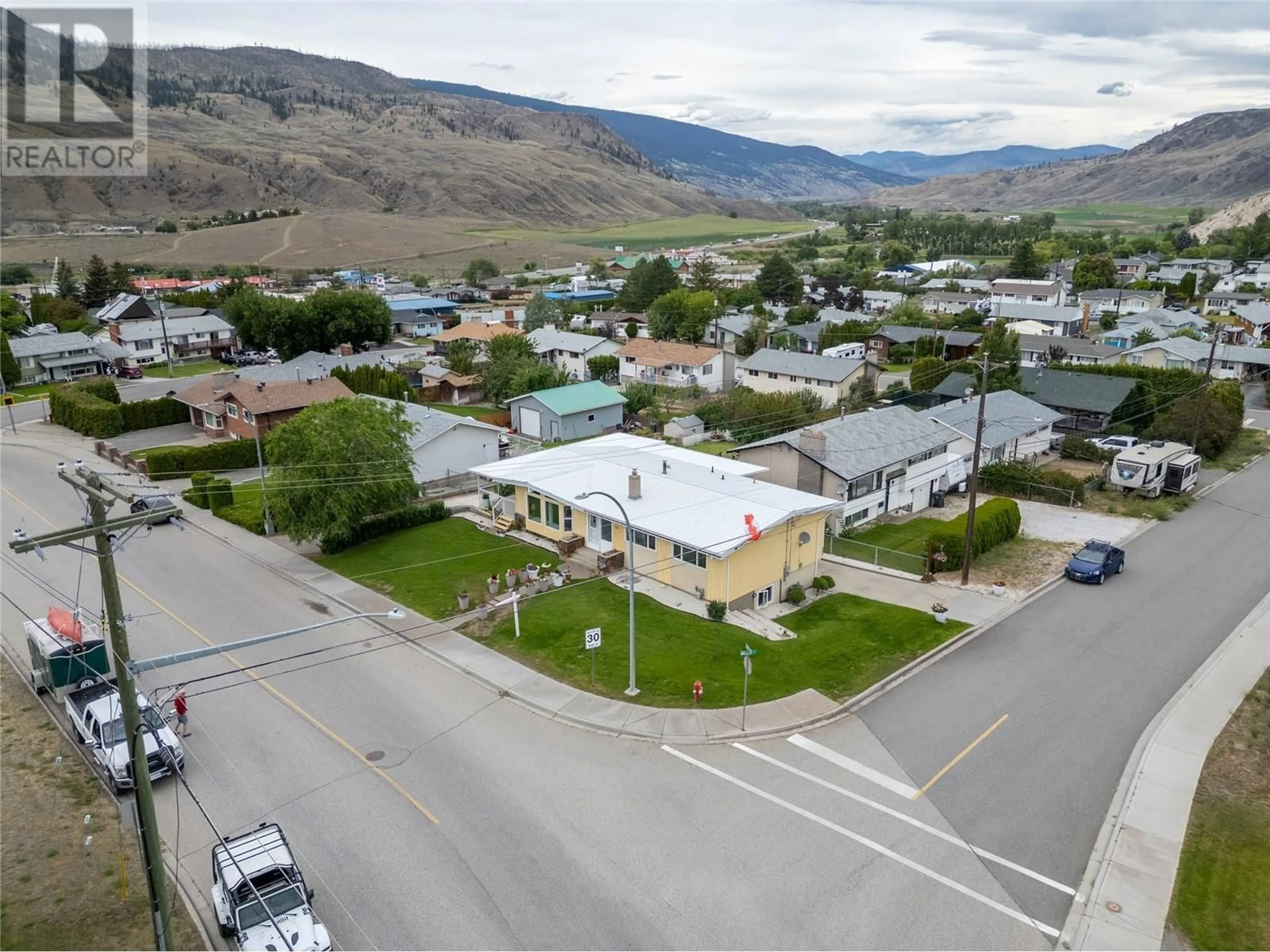 A pic from outside/outdoor area/front of a property/back of a property/a pic from drone, mountain view for 1118 MACLEAN CRESCENT, Cache Creek British Columbia V0K1H0