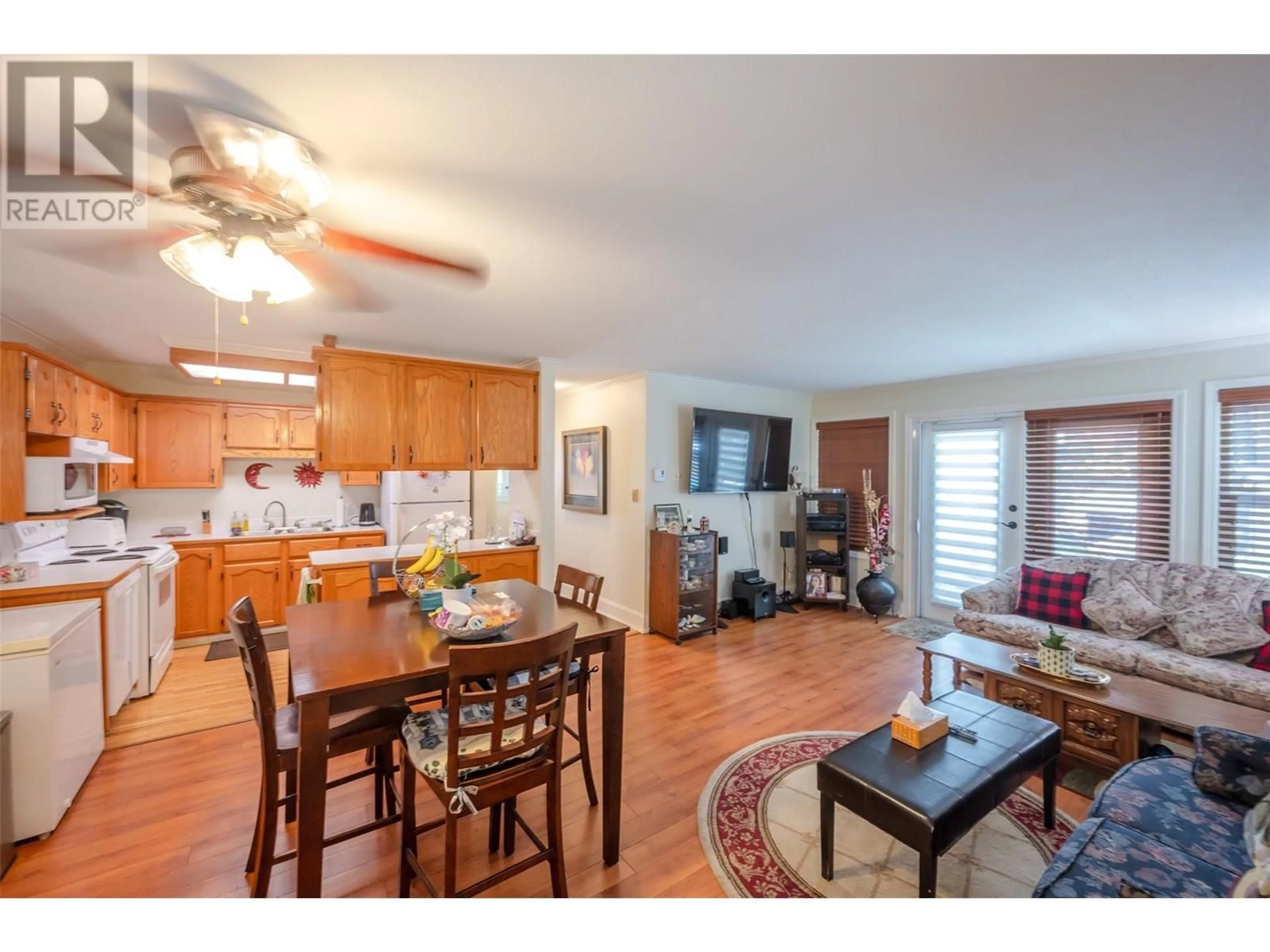Open concept kitchen, wood/laminate floor for 104 - 1780 ATKINSON STREET, Penticton British Columbia V2A7M6
