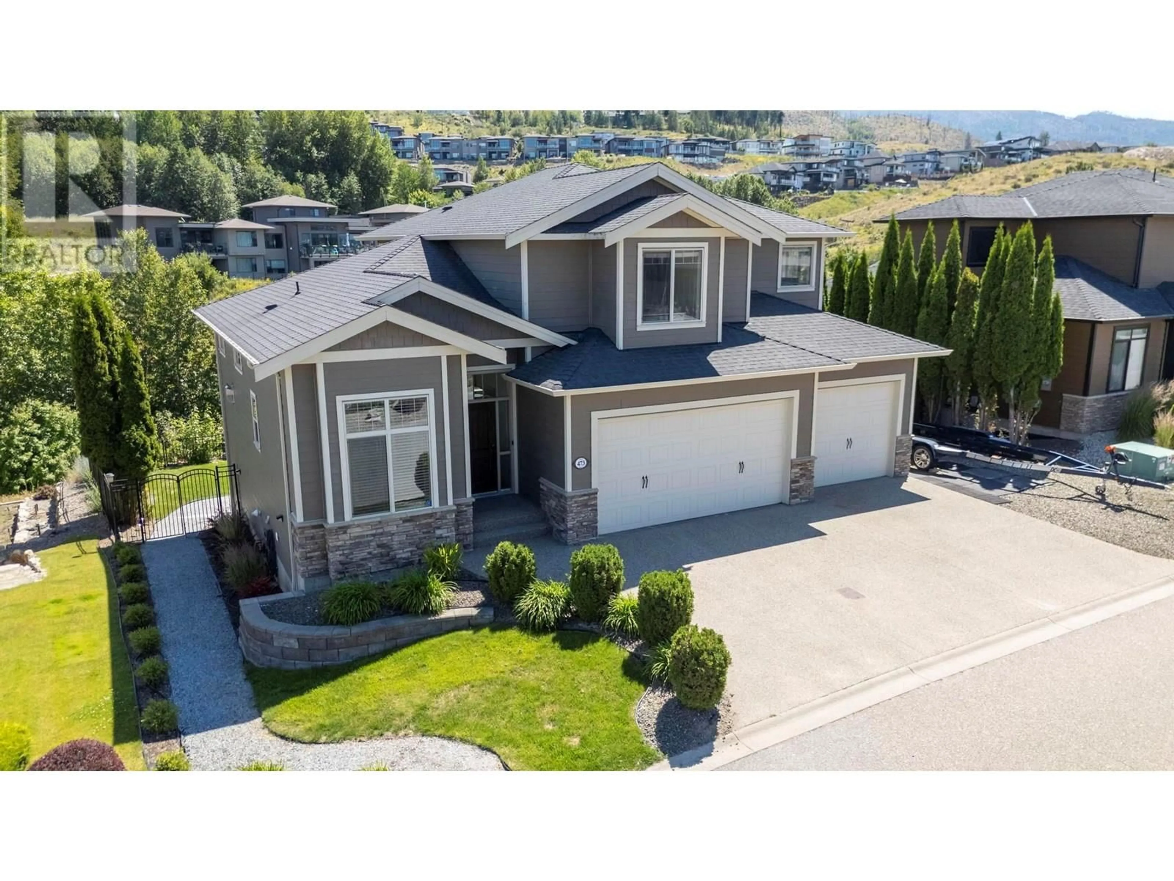 A pic from outside/outdoor area/front of a property/back of a property/a pic from drone, street for 473 SWAN DRIVE, Kelowna British Columbia V1W5J5