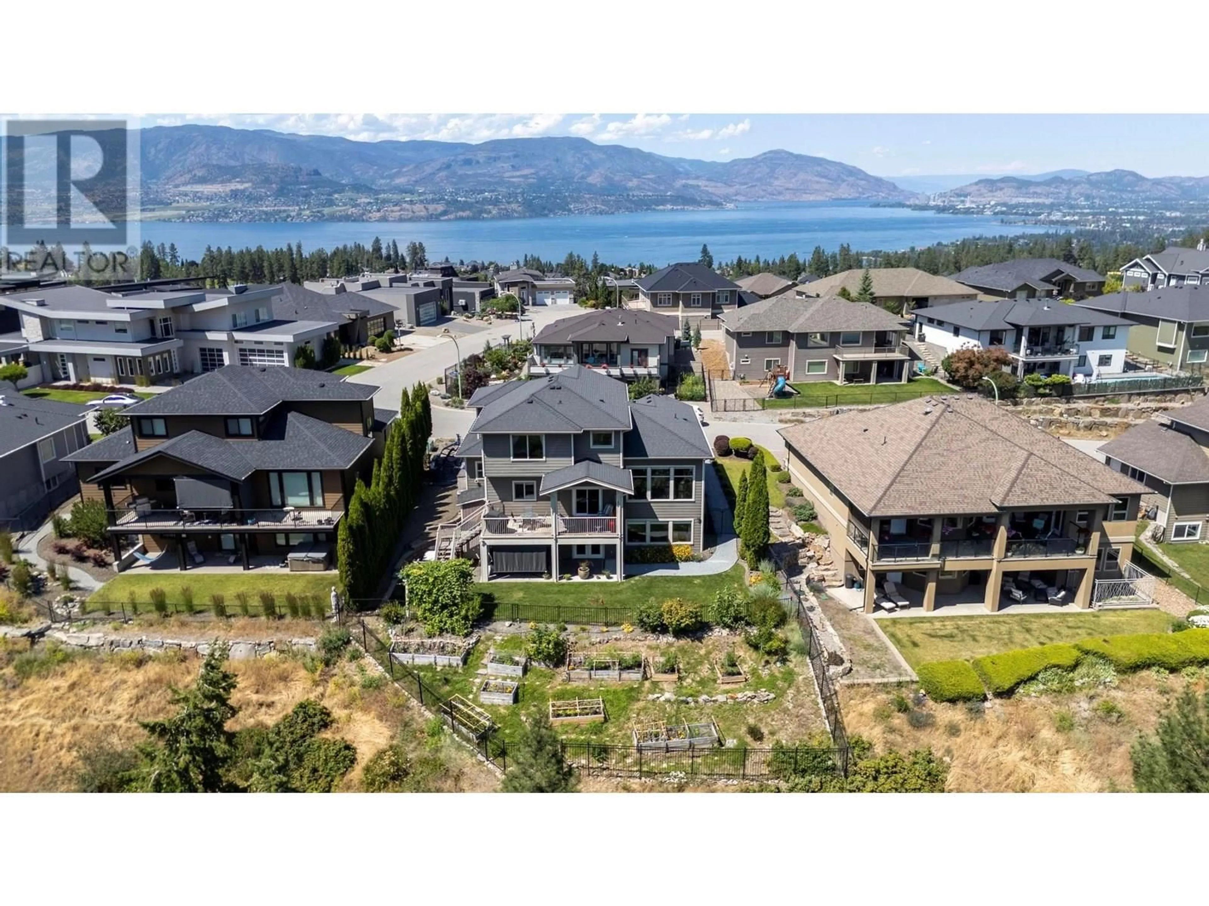 A pic from outside/outdoor area/front of a property/back of a property/a pic from drone, water/lake/river/ocean view for 473 SWAN DRIVE, Kelowna British Columbia V1W5J5
