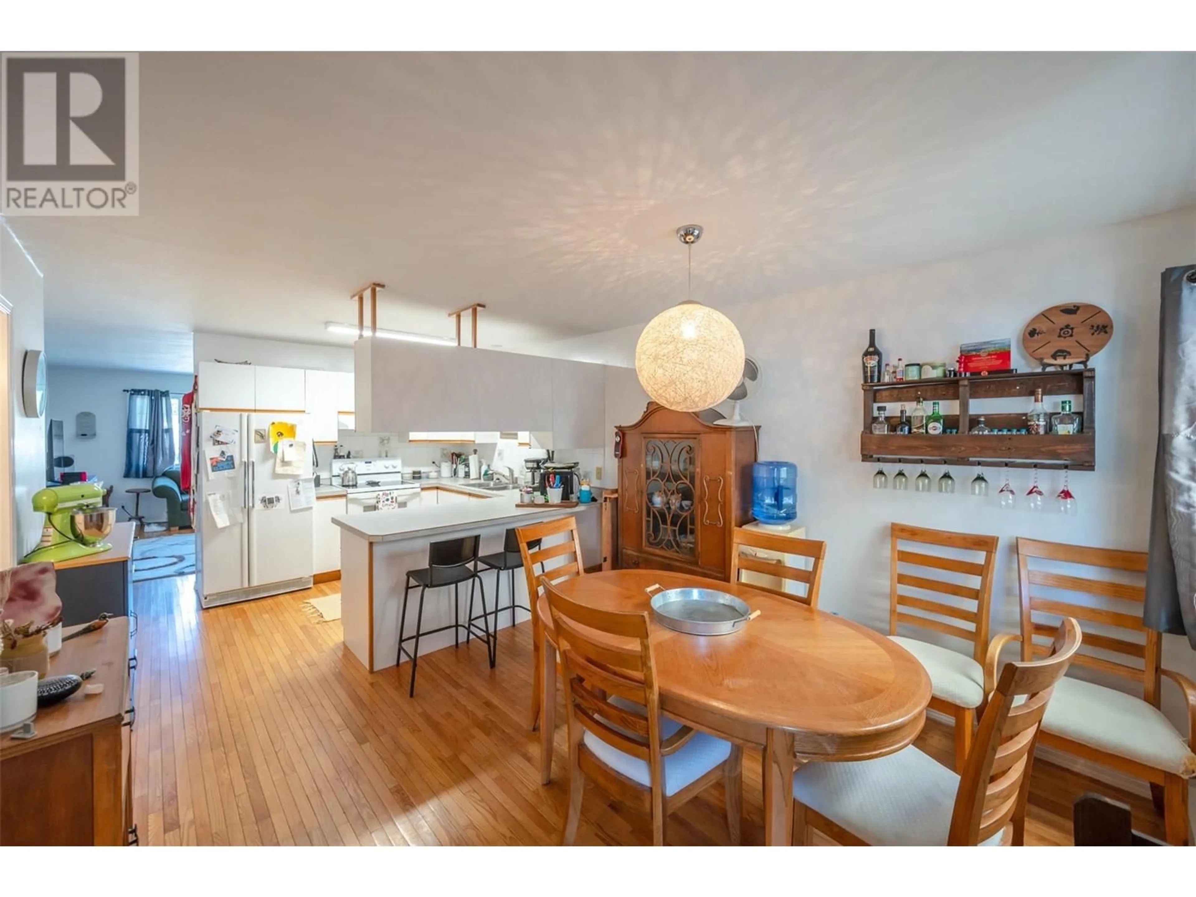 Open concept kitchen, wood/laminate floor for 20 CACTUS CRESCENT, Osoyoos British Columbia V0H1V1