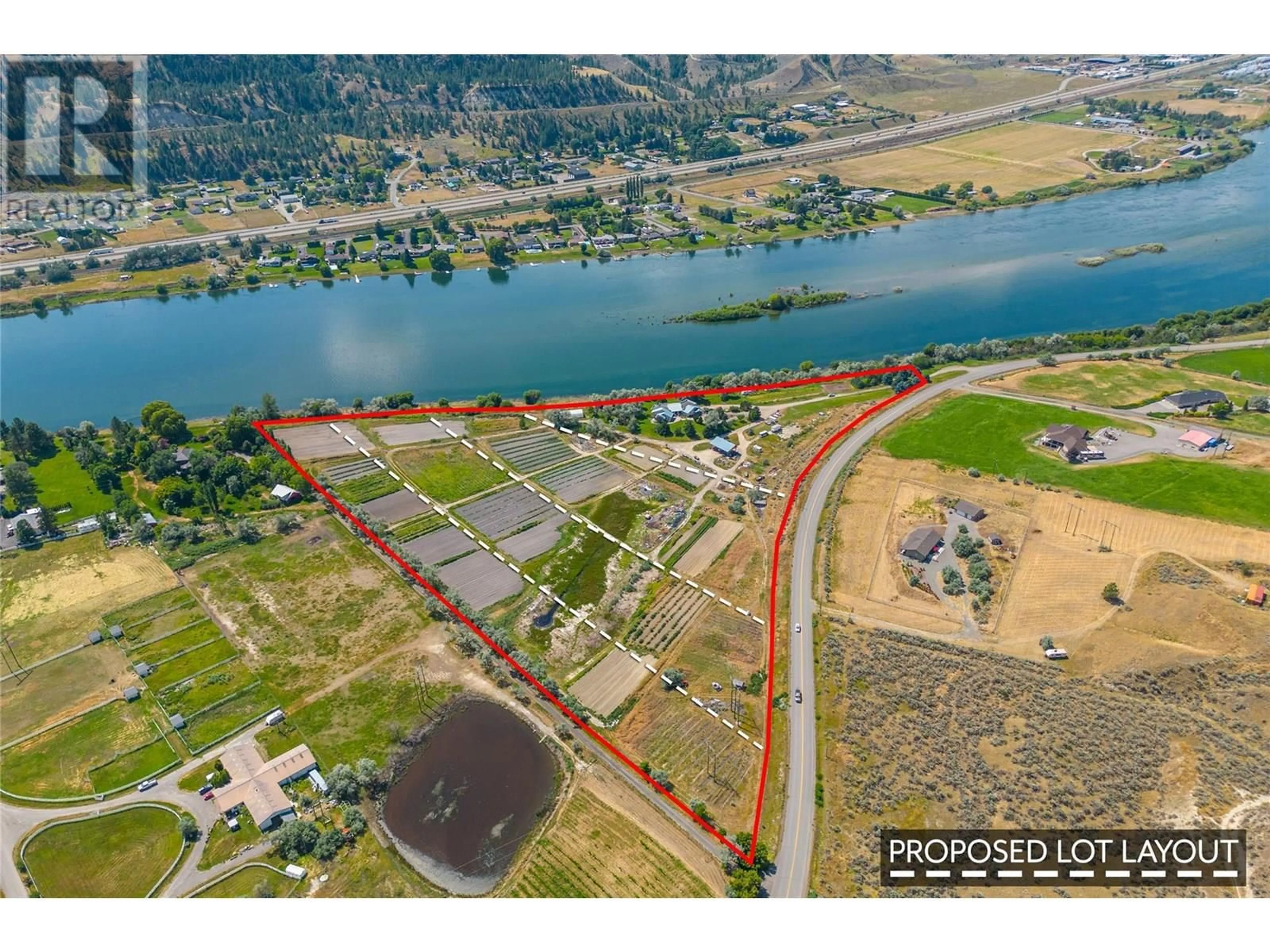 A pic from outside/outdoor area/front of a property/back of a property/a pic from drone, water/lake/river/ocean view for 3390 SHUSWAP  E ROAD, Kamloops British Columbia V2H1T2