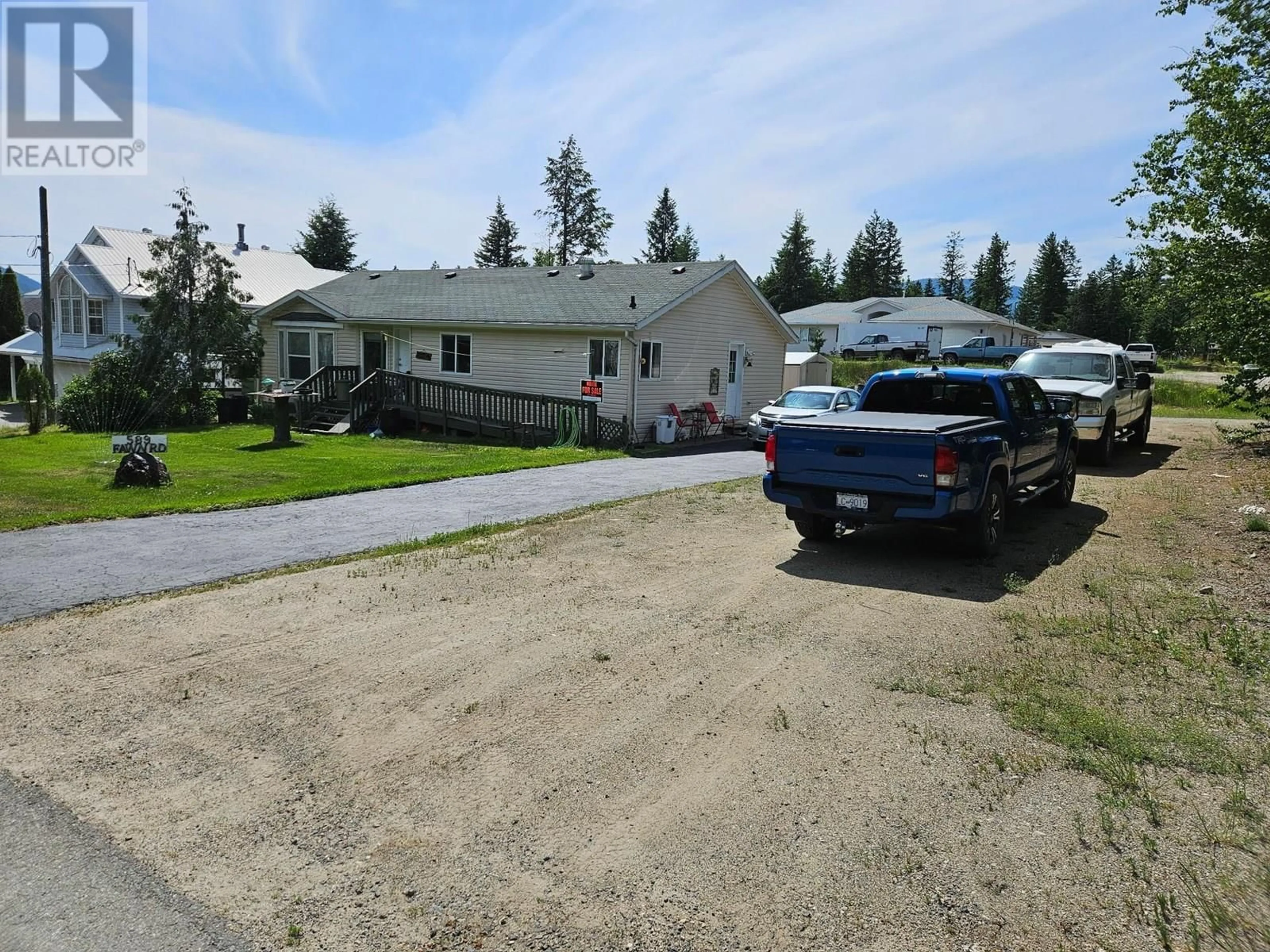 A pic from outside/outdoor area/front of a property/back of a property/a pic from drone, street for 589 FAWN ROAD, 100 Mile House British Columbia V0E1N1