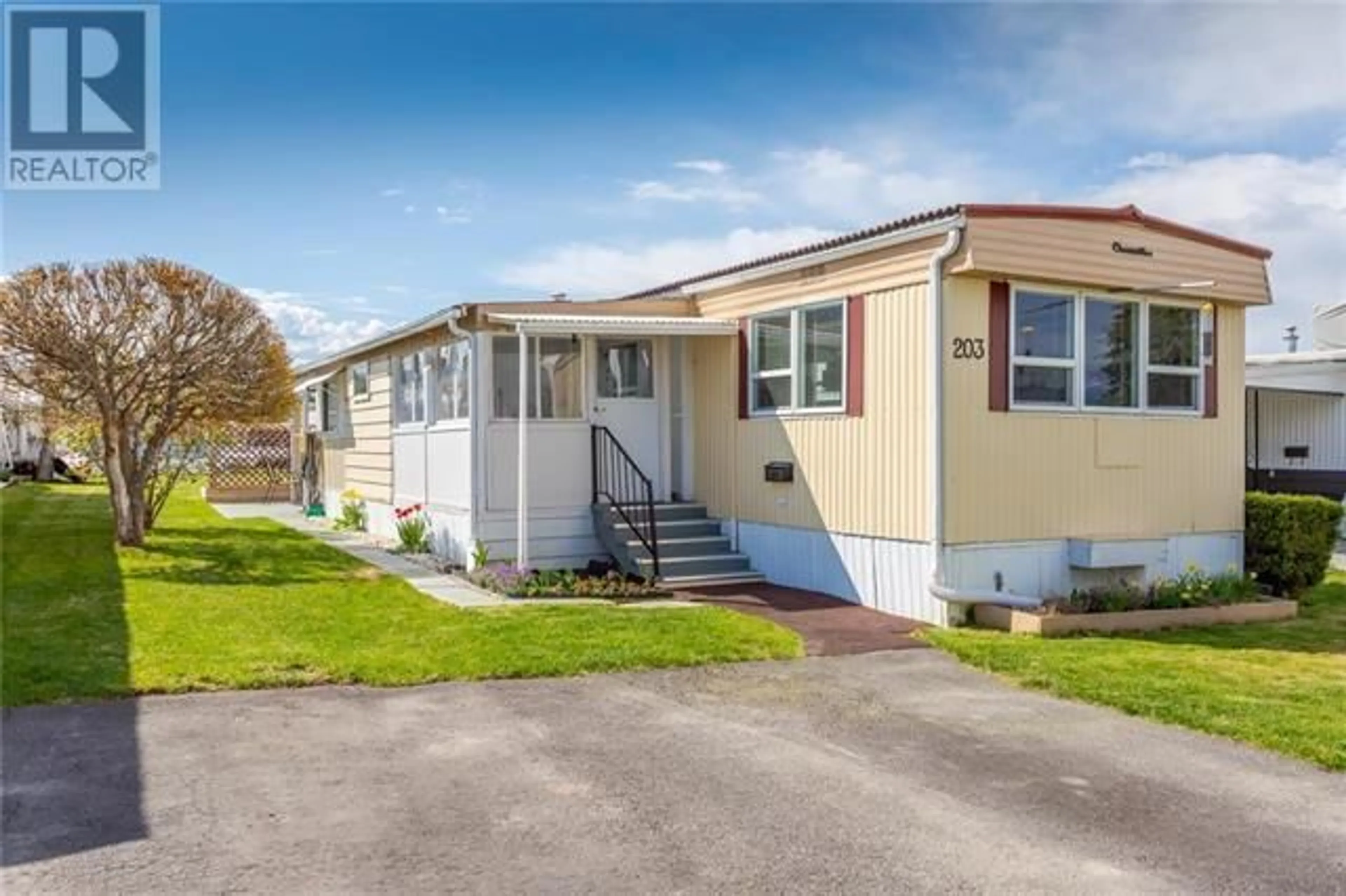 Home with vinyl exterior material, street for 203 - 3591 OLD VERNON ROAD, Kelowna British Columbia V1X6P4