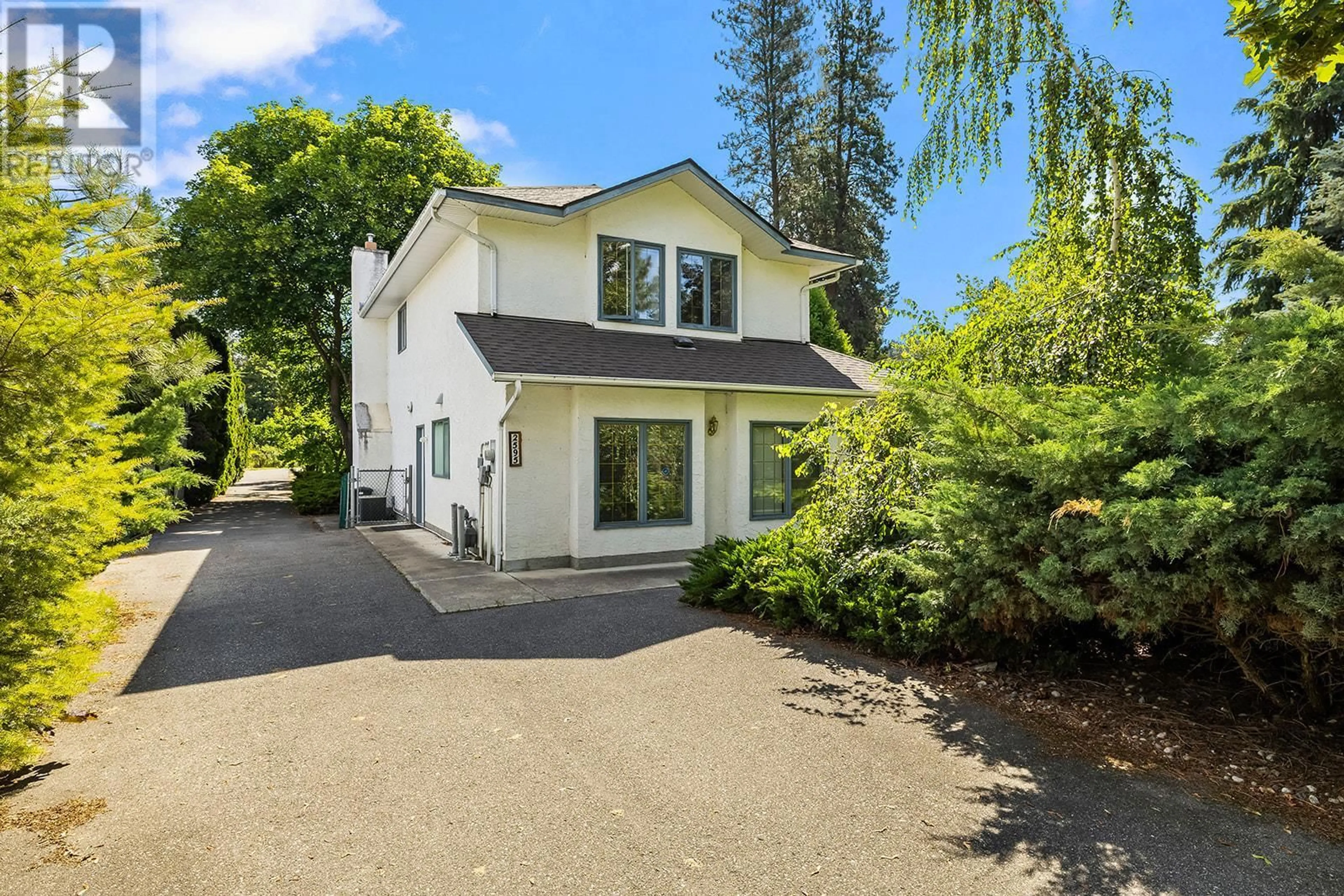 A pic from outside/outdoor area/front of a property/back of a property/a pic from drone, street for 2595 MAQUINNA ROAD, Kelowna British Columbia V1W2R9