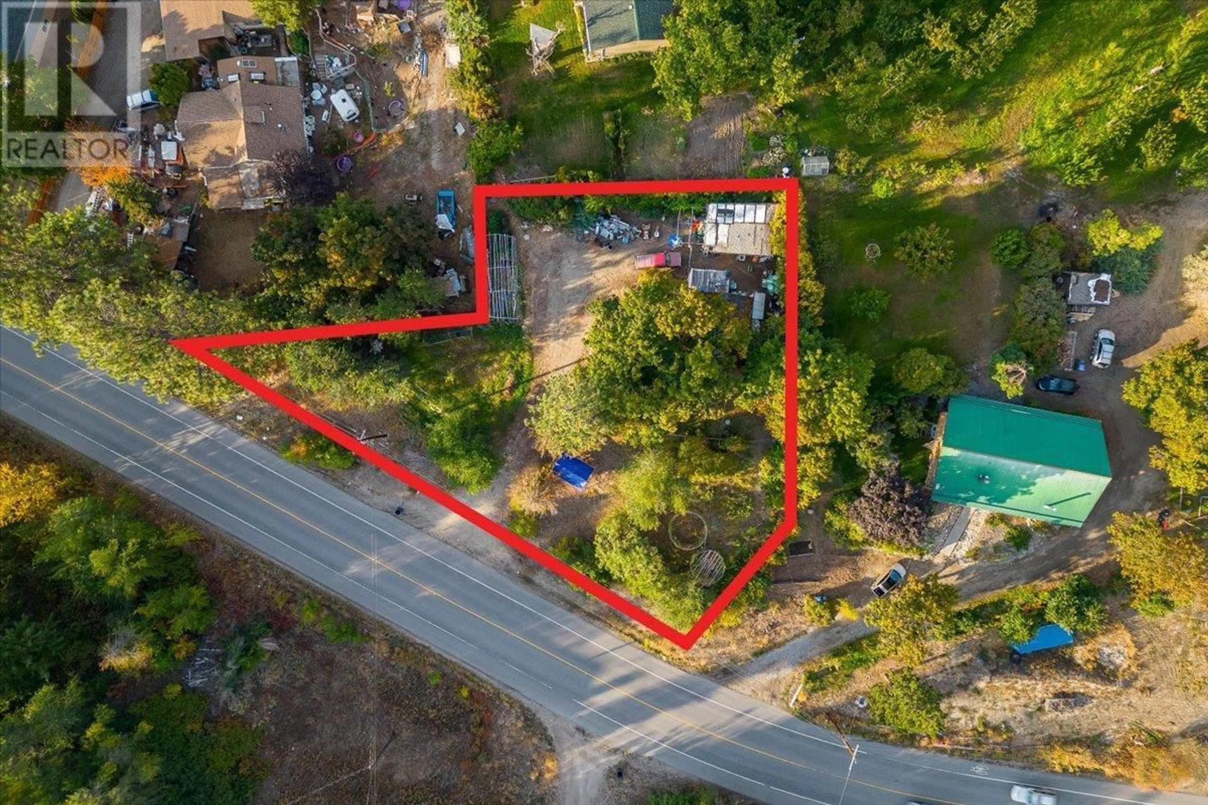 A pic from outside/outdoor area/front of a property/back of a property/a pic from drone, street for 3122 MCCULLOCH ROAD, Kelowna British Columbia V1W4G6