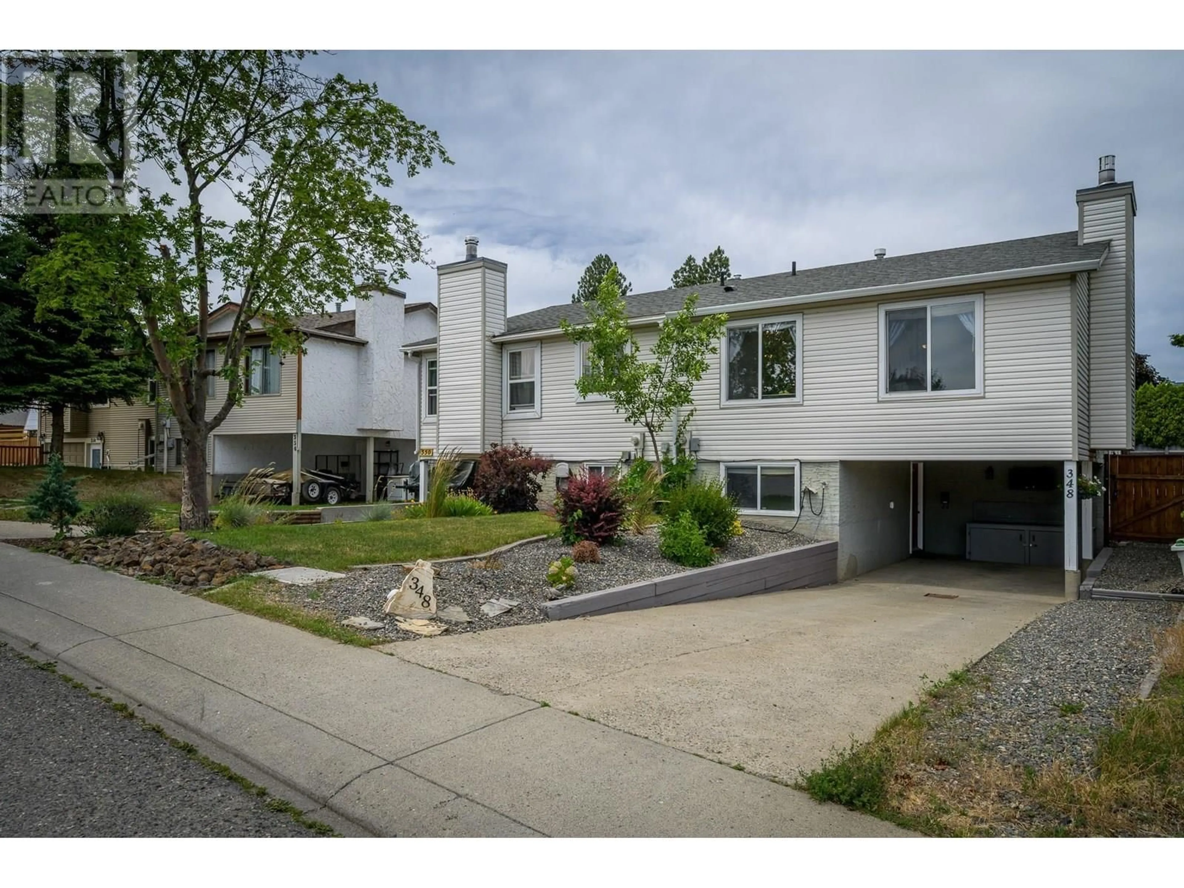 Home with vinyl exterior material, street for 348 HOLLYBURN DRIVE, Kamloops British Columbia V2E1W5