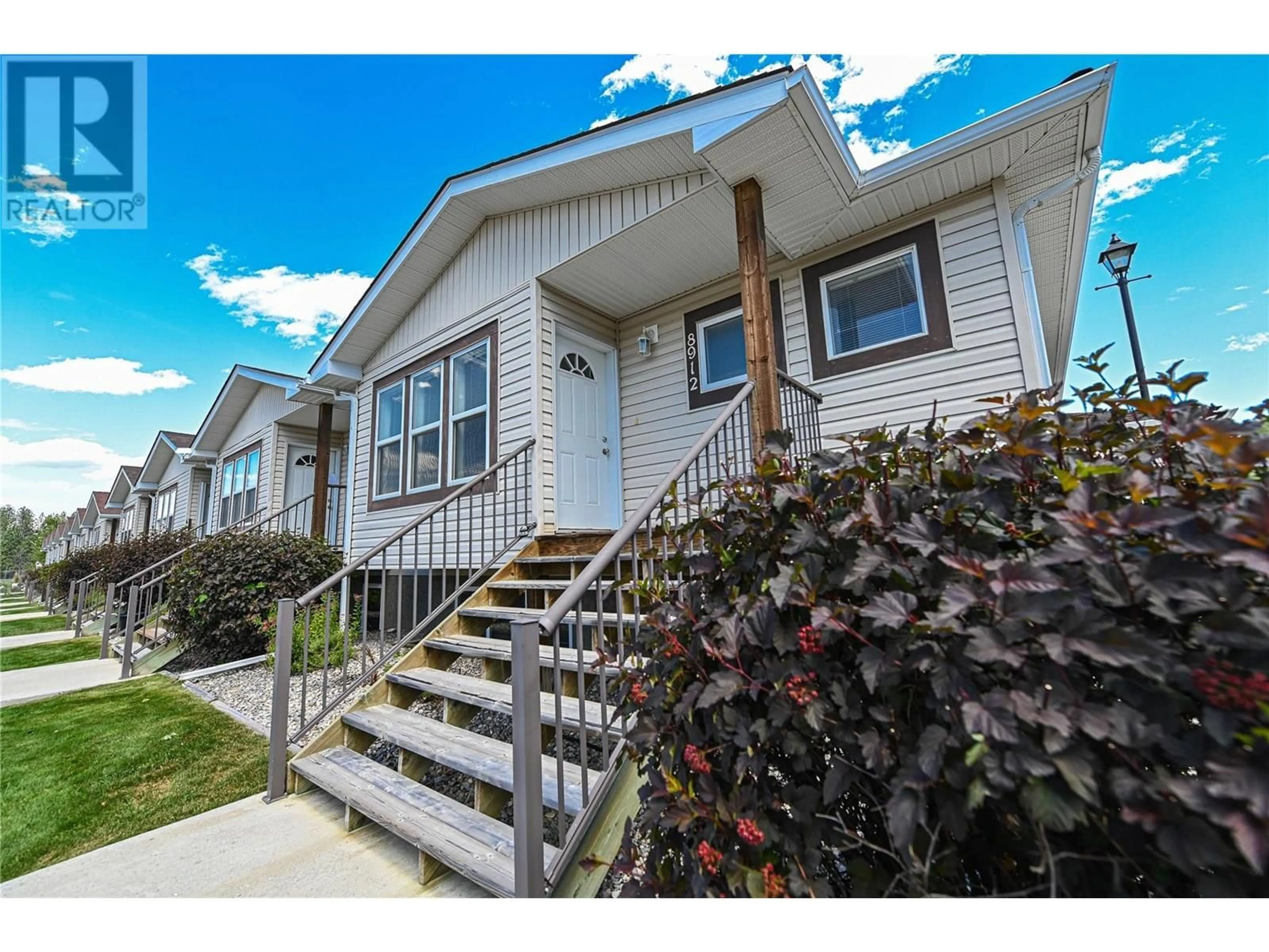 Home with vinyl exterior material, street for 8912 DOHERTY STREET, Canal Flats British Columbia V0B1B0