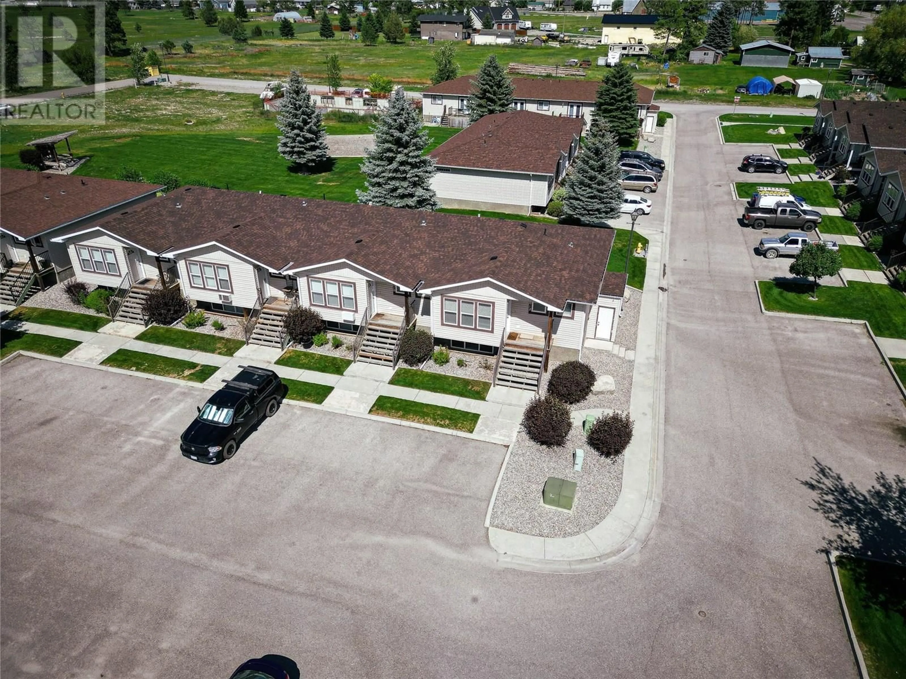 A pic from outside/outdoor area/front of a property/back of a property/a pic from drone, street for 8912 DOHERTY STREET, Canal Flats British Columbia V0B1B0