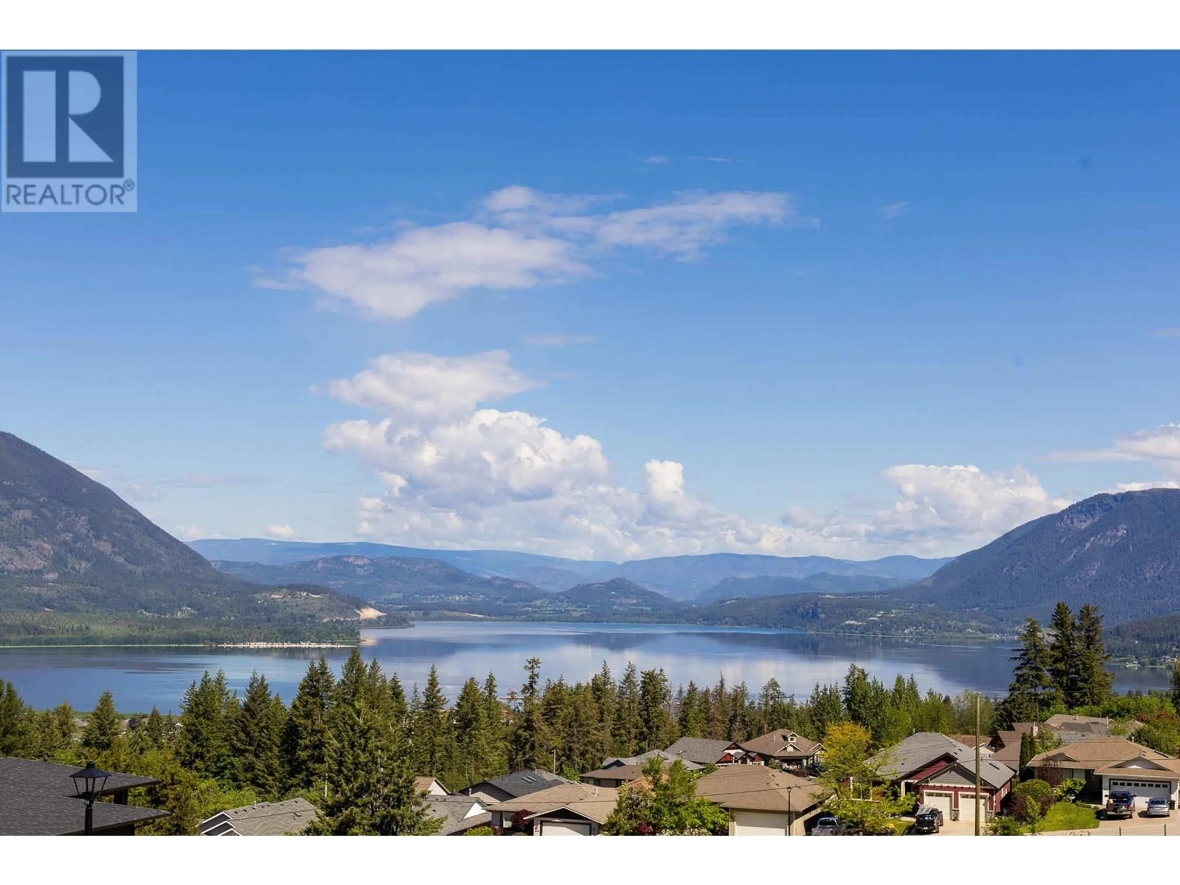 A pic from outside/outdoor area/front of a property/back of a property/a pic from drone, water/lake/river/ocean view for 1121 16 AVENUE SOUTHEAST, Salmon Arm British Columbia V1E2R5