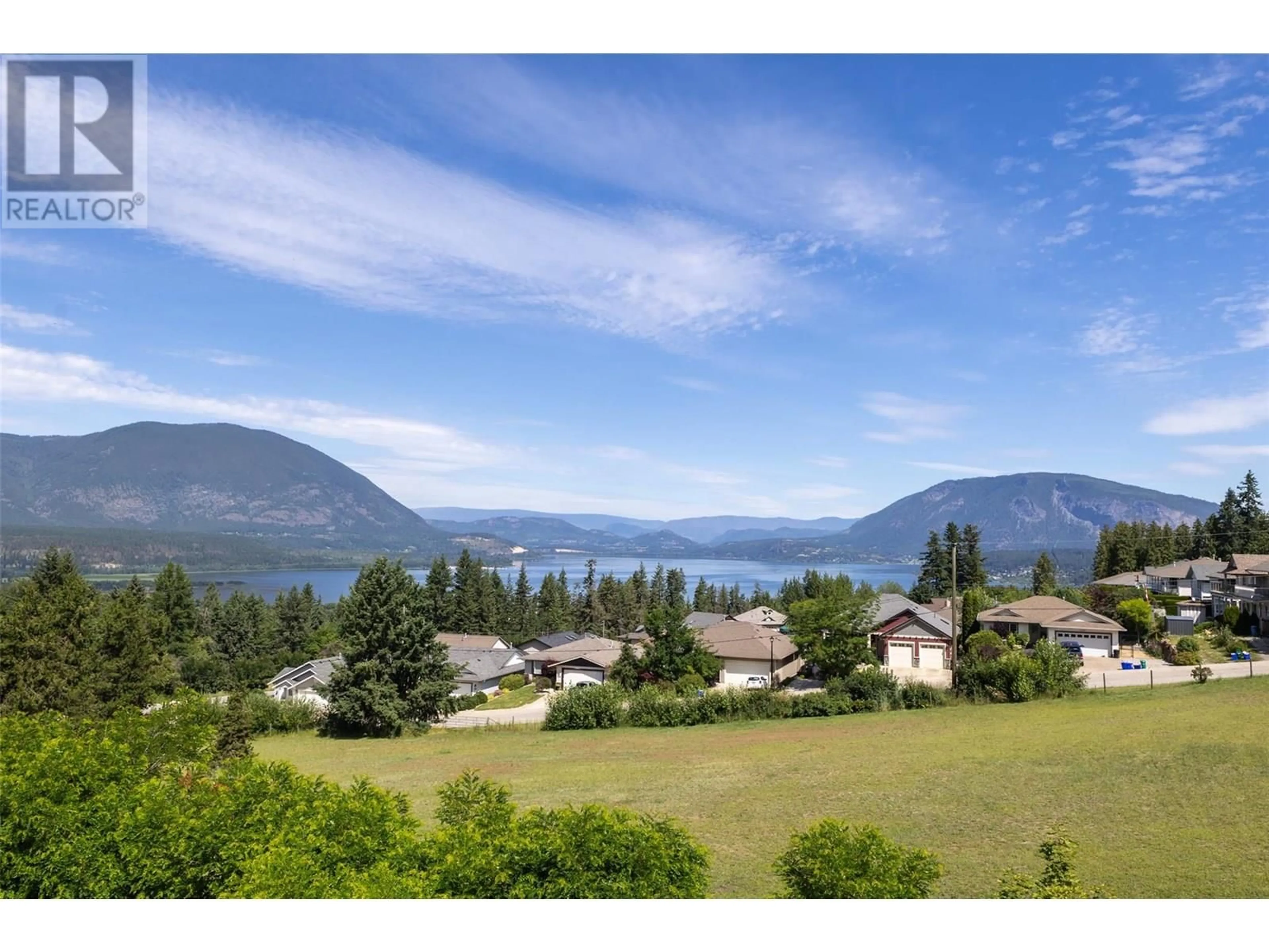 A pic from outside/outdoor area/front of a property/back of a property/a pic from drone, water/lake/river/ocean view for 1121 16 AVENUE SOUTHEAST, Salmon Arm British Columbia V1E2R5
