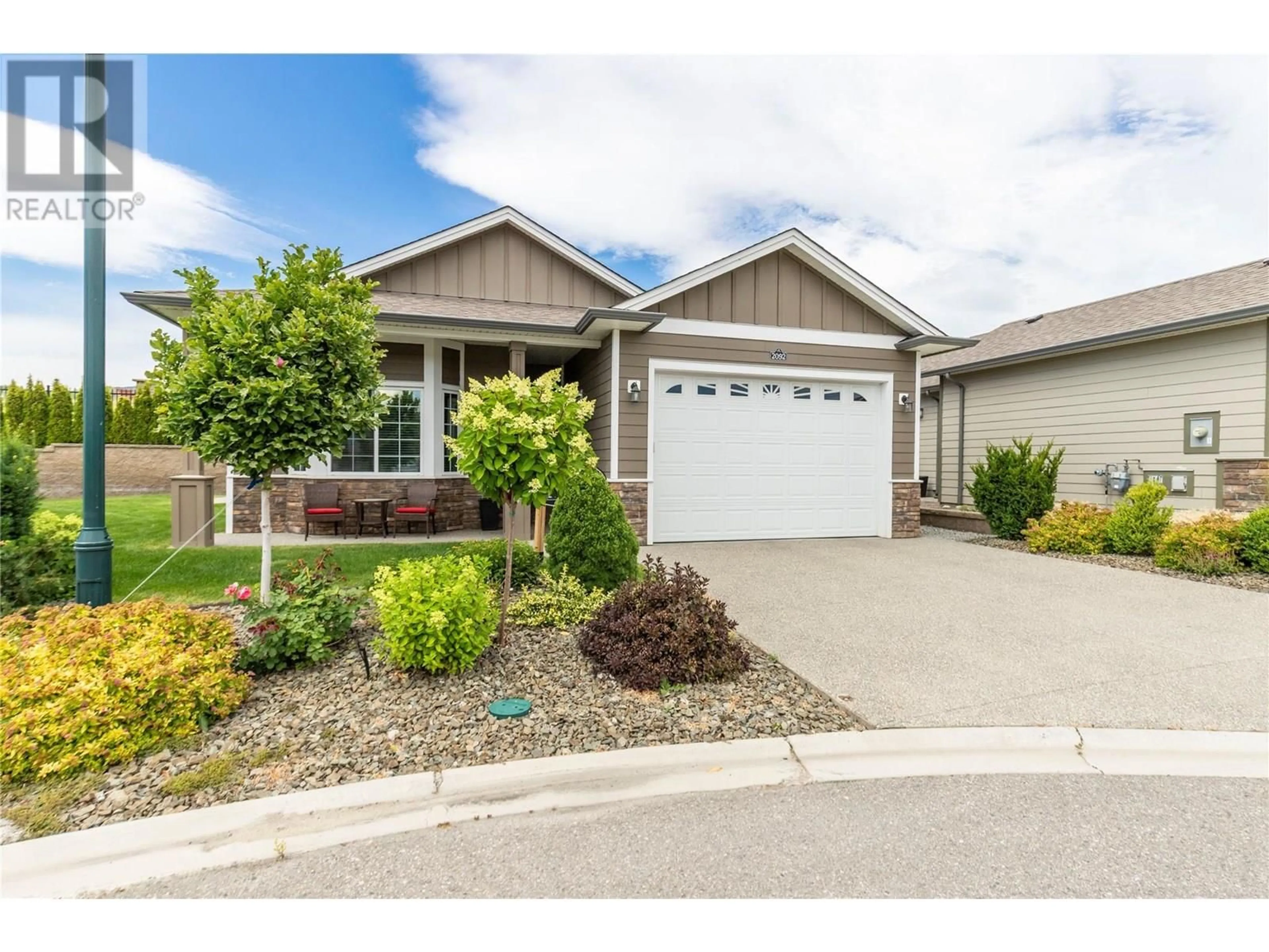 Home with vinyl exterior material, street for 2092 SAGE CRESCENT, Westbank British Columbia V4T3A5