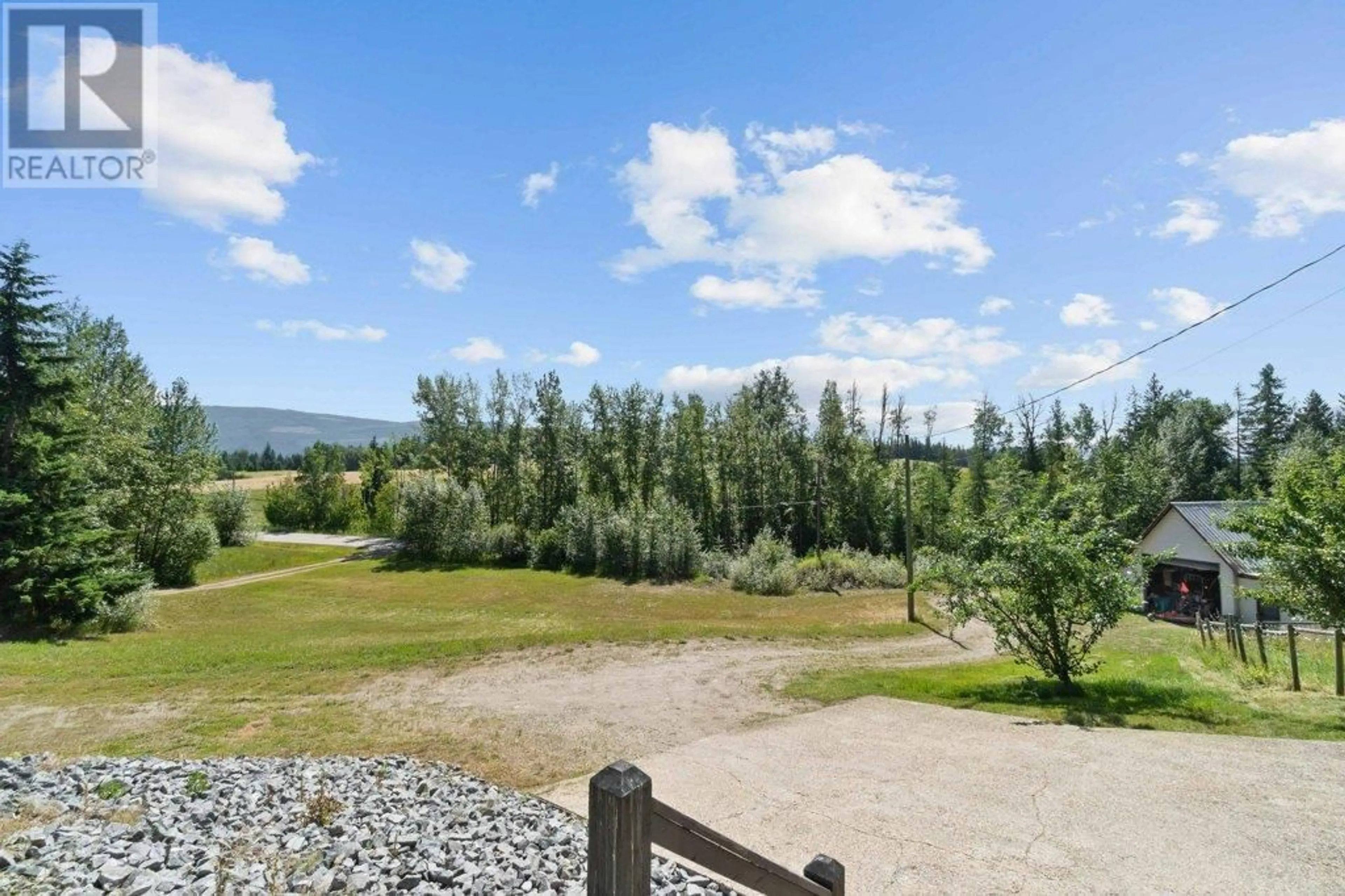 A pic from outside/outdoor area/front of a property/back of a property/a pic from drone, unknown for 627 GRANDVIEW BENCH ROAD SOUTHEAST, Salmon Arm British Columbia V1E2X9
