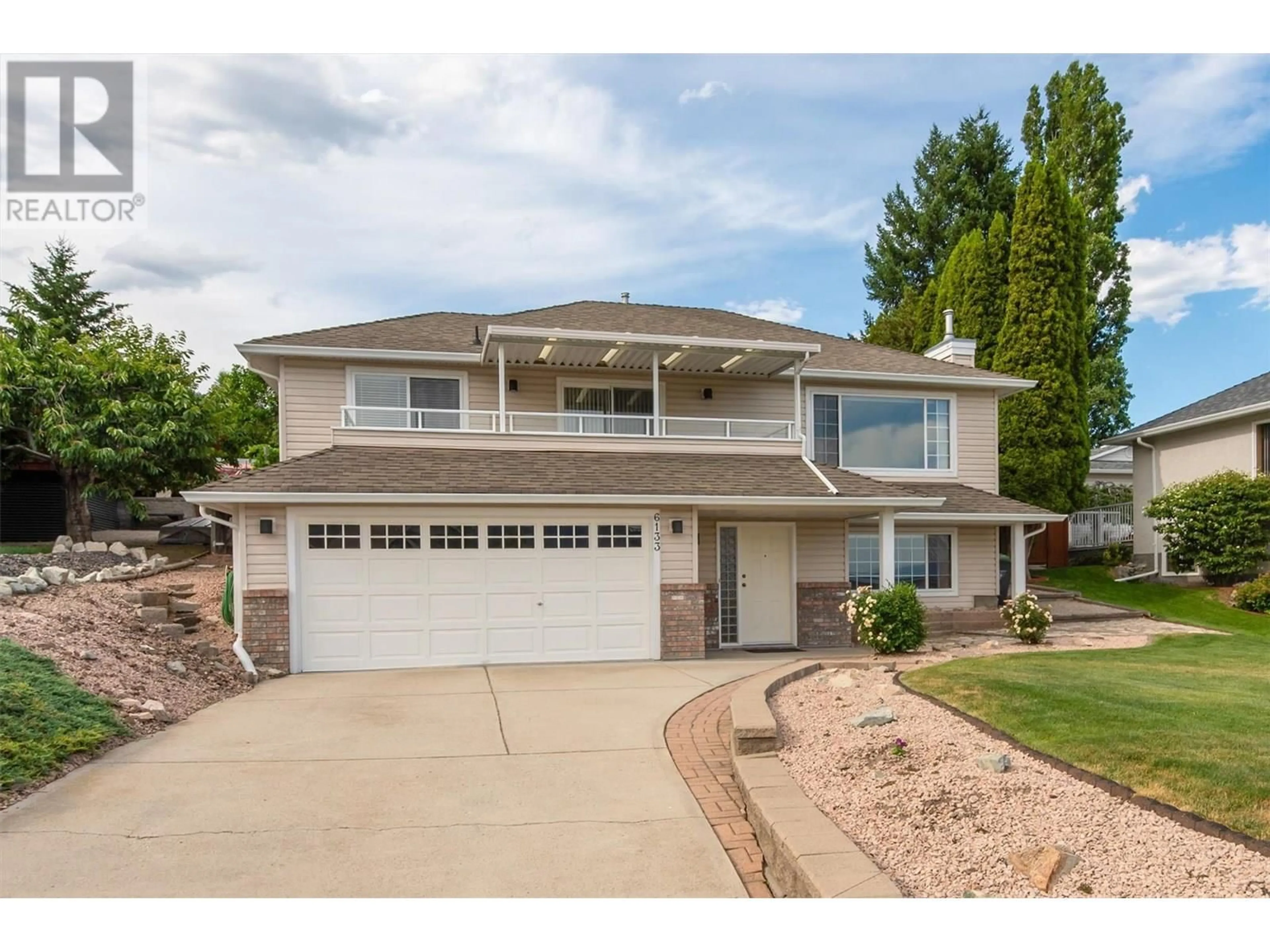 Home with vinyl exterior material, street for 6133 AITKENS ROAD, Peachland British Columbia V0H1X7