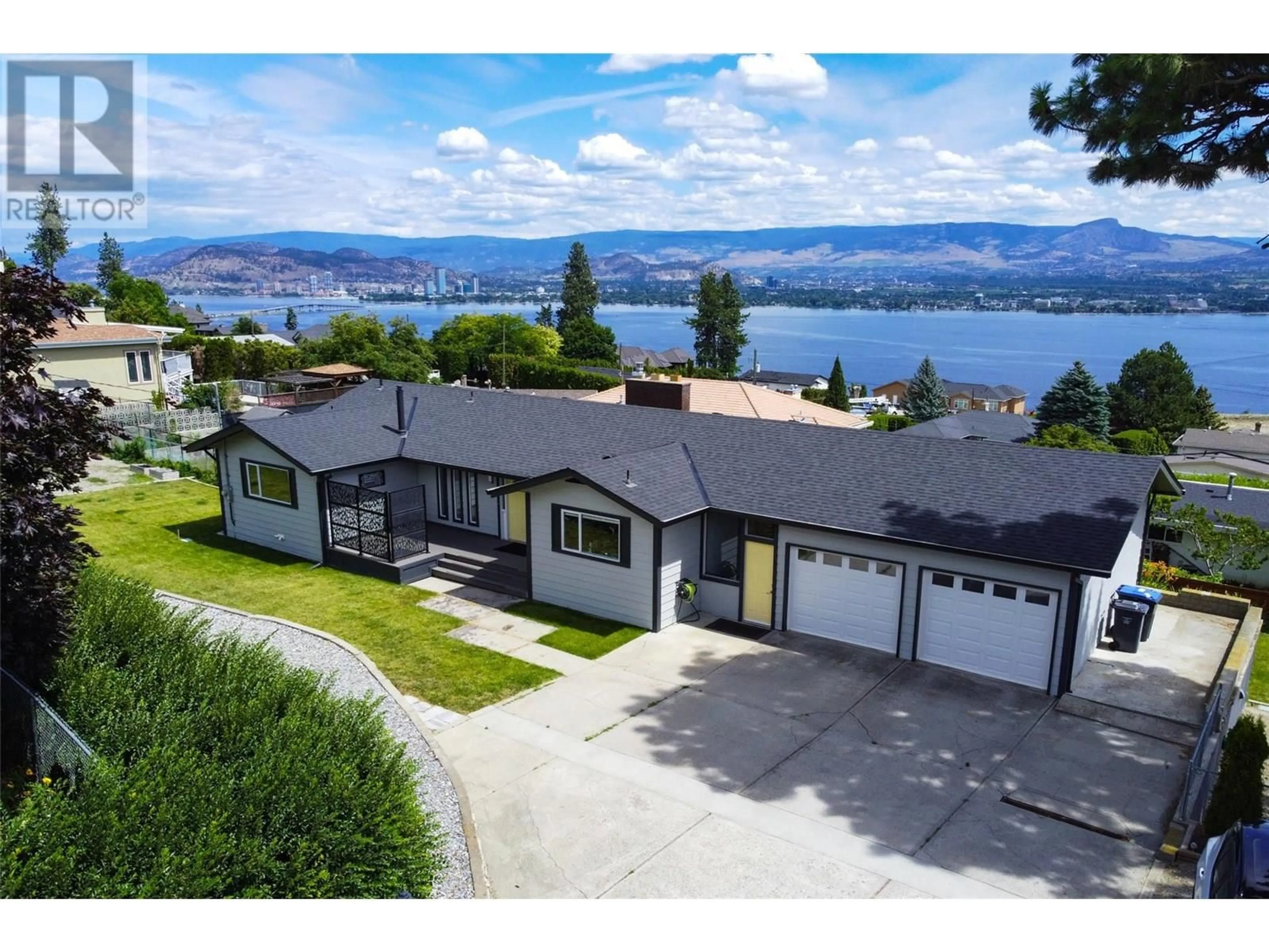 A pic from outside/outdoor area/front of a property/back of a property/a pic from drone, water/lake/river/ocean view for 2865 THACKER DRIVE, West Kelowna British Columbia V1Z1W7