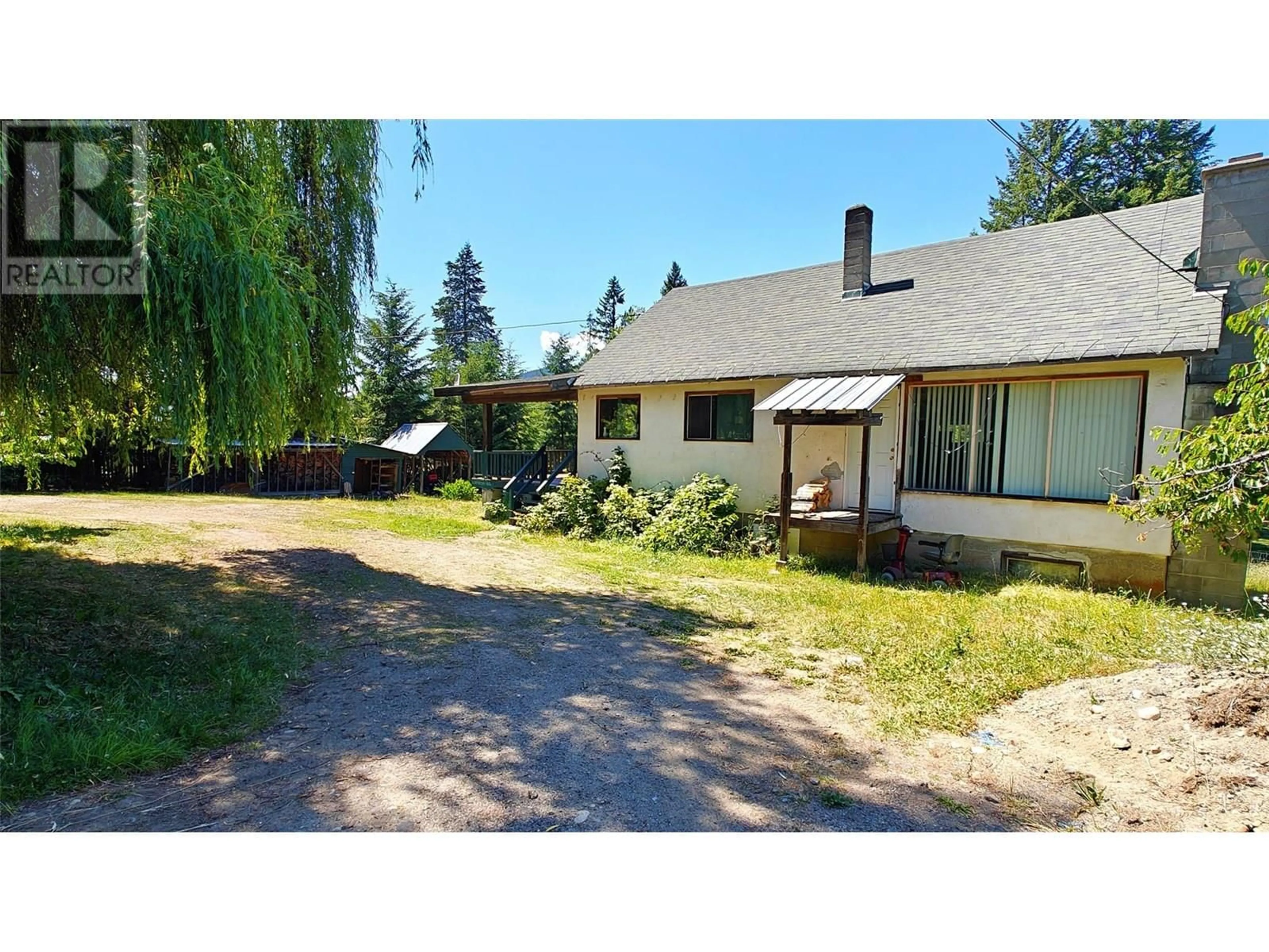 A pic from outside/outdoor area/front of a property/back of a property/a pic from drone, street for 2029 DEBRUYN ROAD, Fruitvale British Columbia V0G1L1