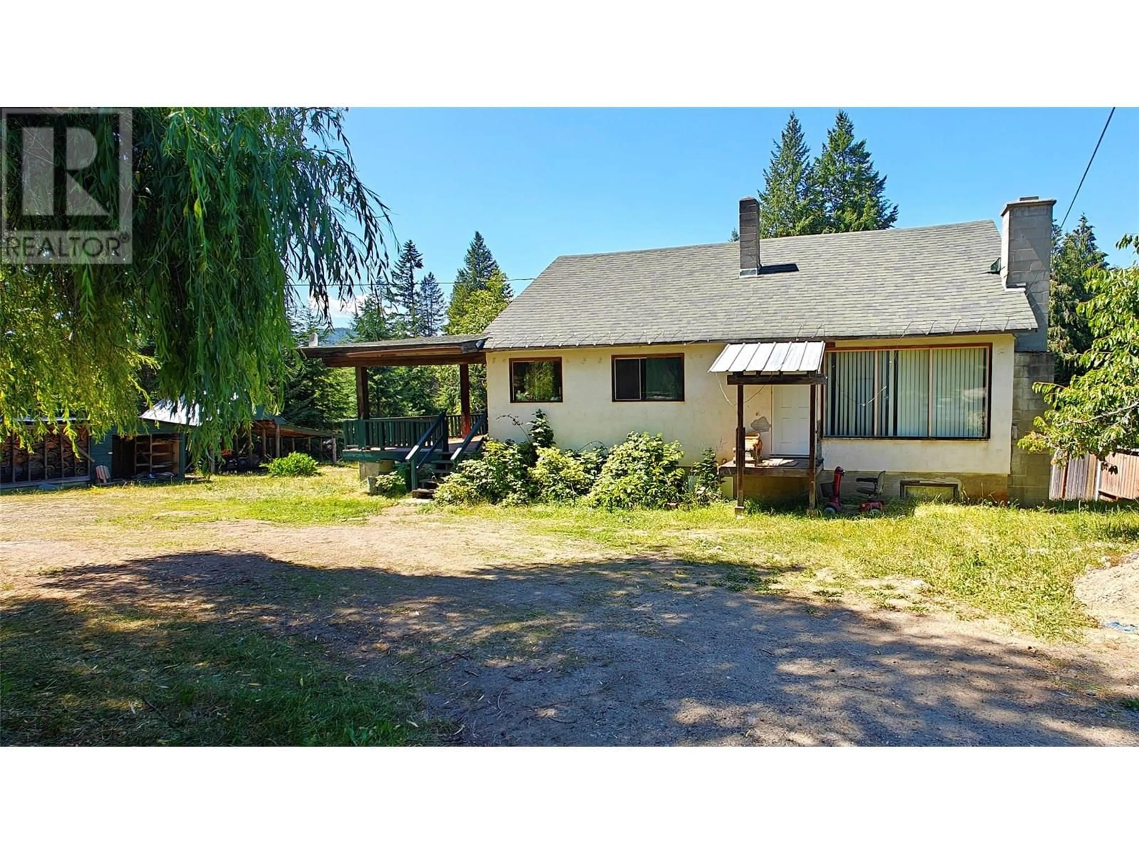 A pic from outside/outdoor area/front of a property/back of a property/a pic from drone, street for 2029 DEBRUYN ROAD, Fruitvale British Columbia V0G1L1