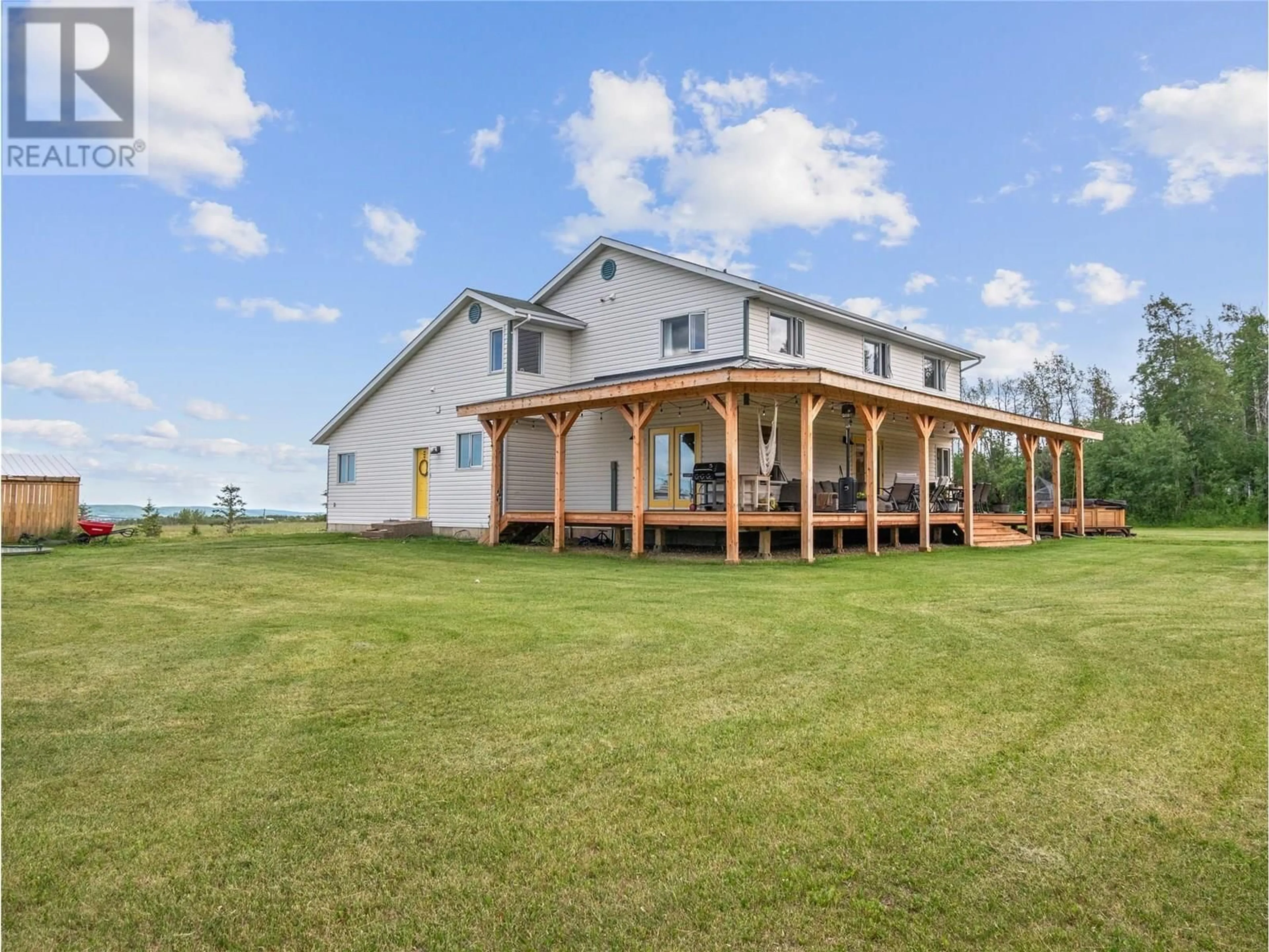 A pic from outside/outdoor area/front of a property/back of a property/a pic from drone, water/lake/river/ocean view for 3443 210 ROAD, Dawson Creek British Columbia V1G0C2