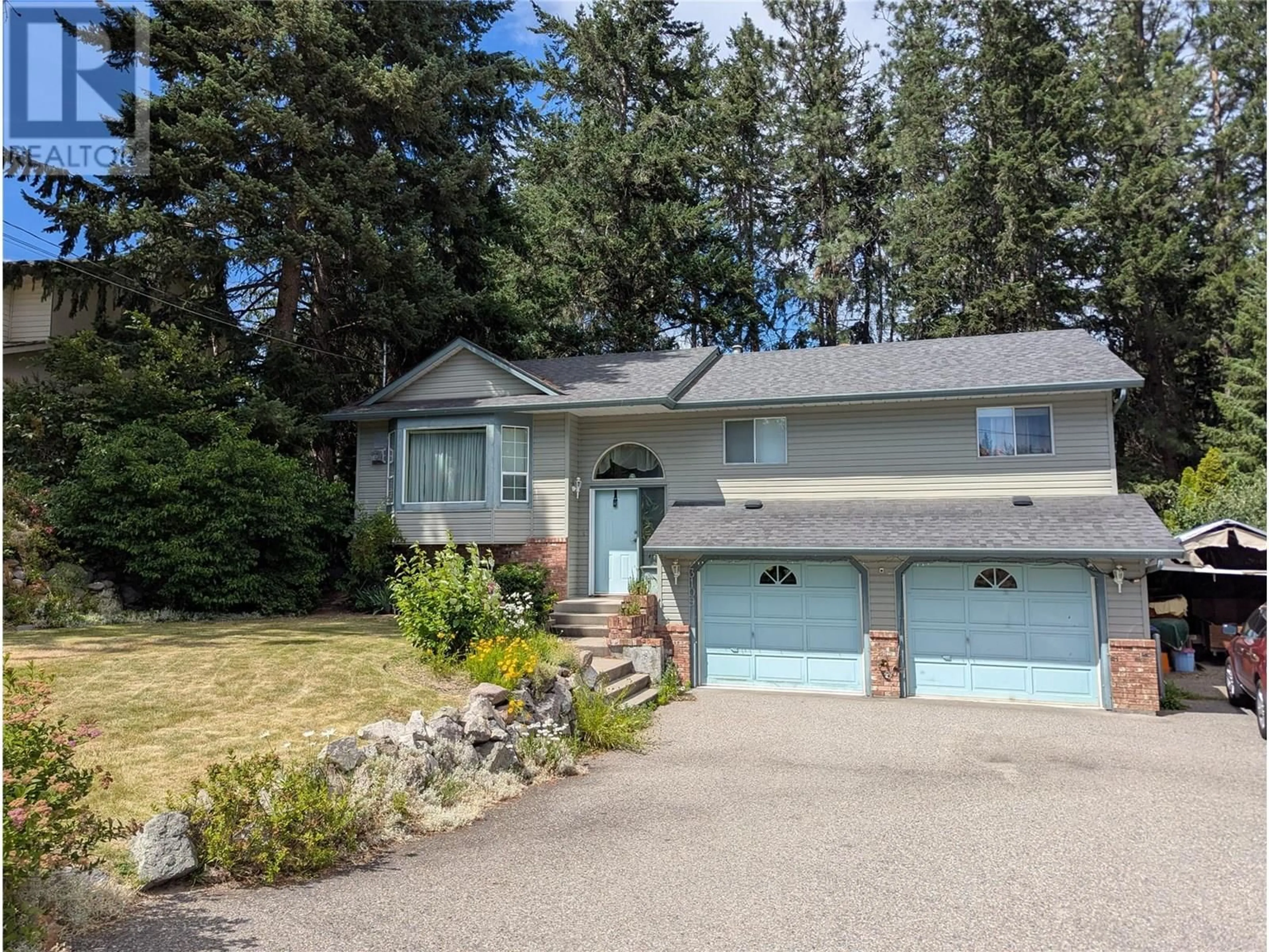 Home with vinyl exterior material, street for 3109 MCIVER ROAD, West Kelowna British Columbia V4T1E6