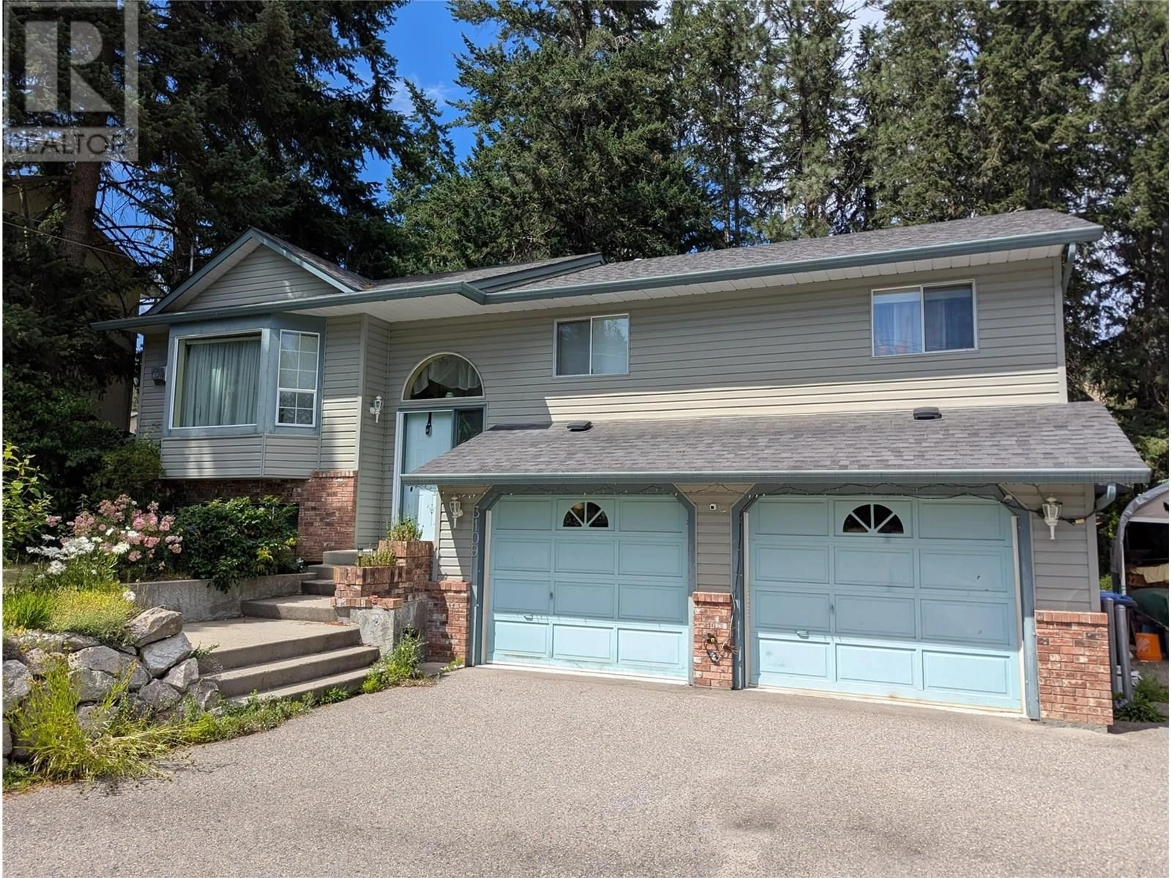 Home with vinyl exterior material, street for 3109 MCIVER ROAD, West Kelowna British Columbia V4T1E6