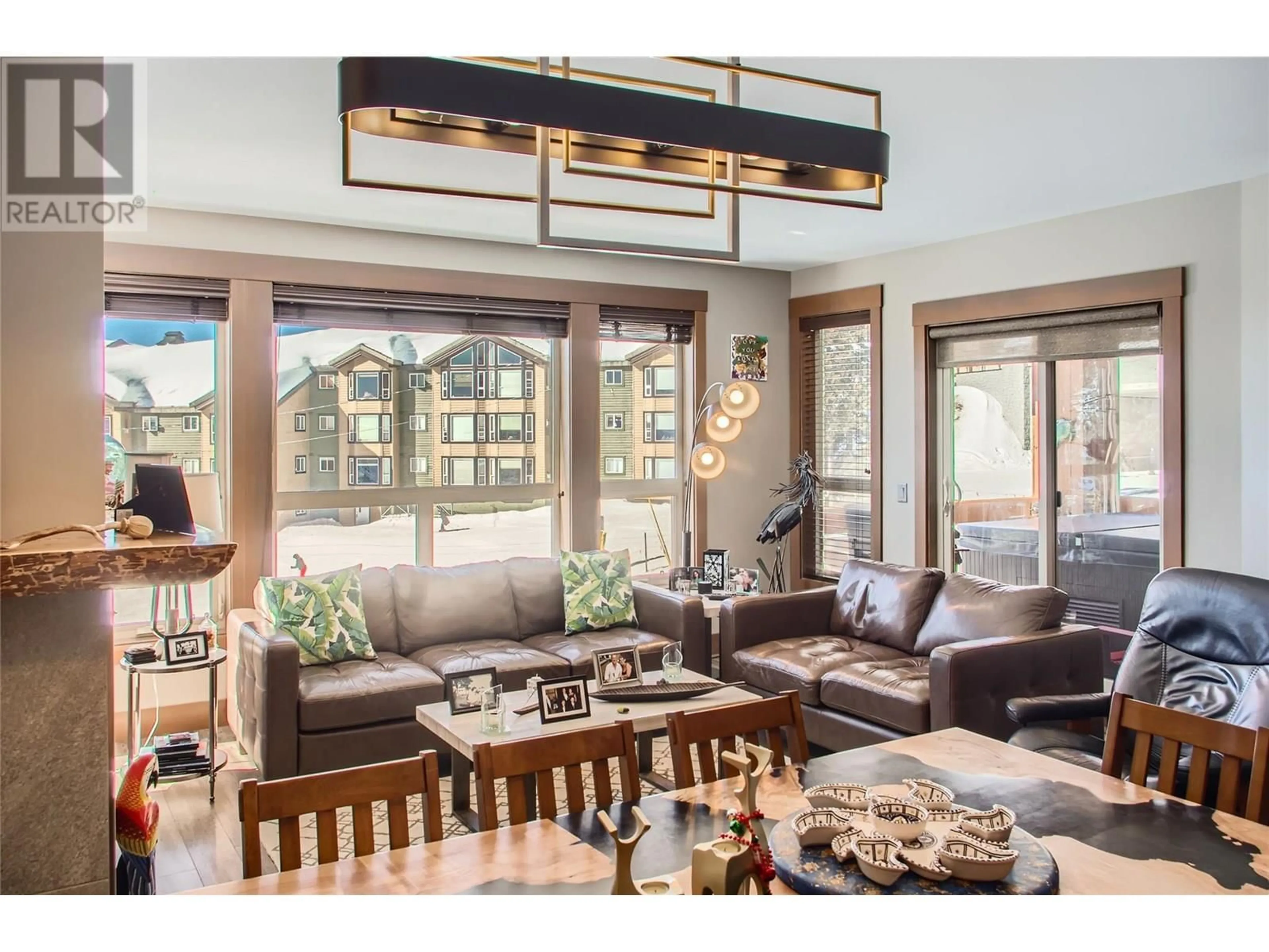 Living room with furniture, wood/laminate floor for 203B - 5300 BIG WHITE ROAD, Big White British Columbia V1P1P3