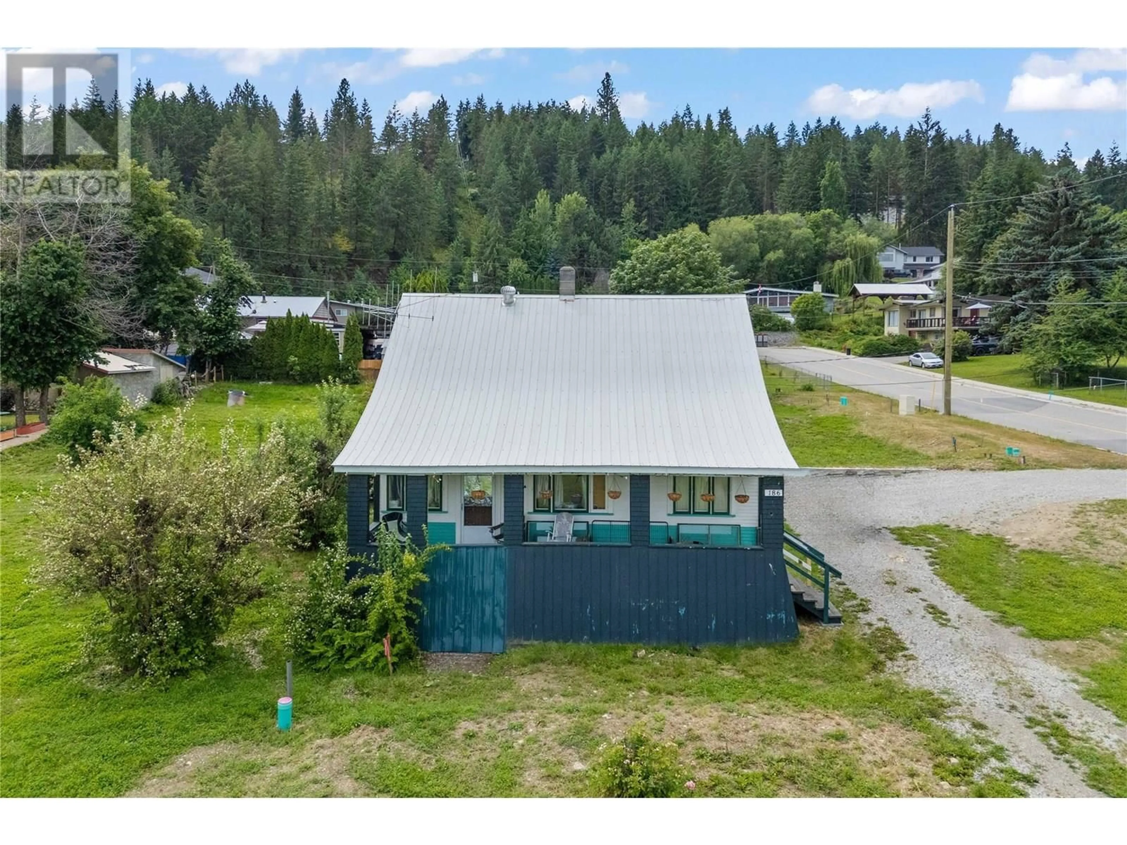 A pic from outside/outdoor area/front of a property/back of a property/a pic from drone, water/lake/river/ocean view for 186 SALMON ARM DRIVE, Enderby British Columbia V0E1V1