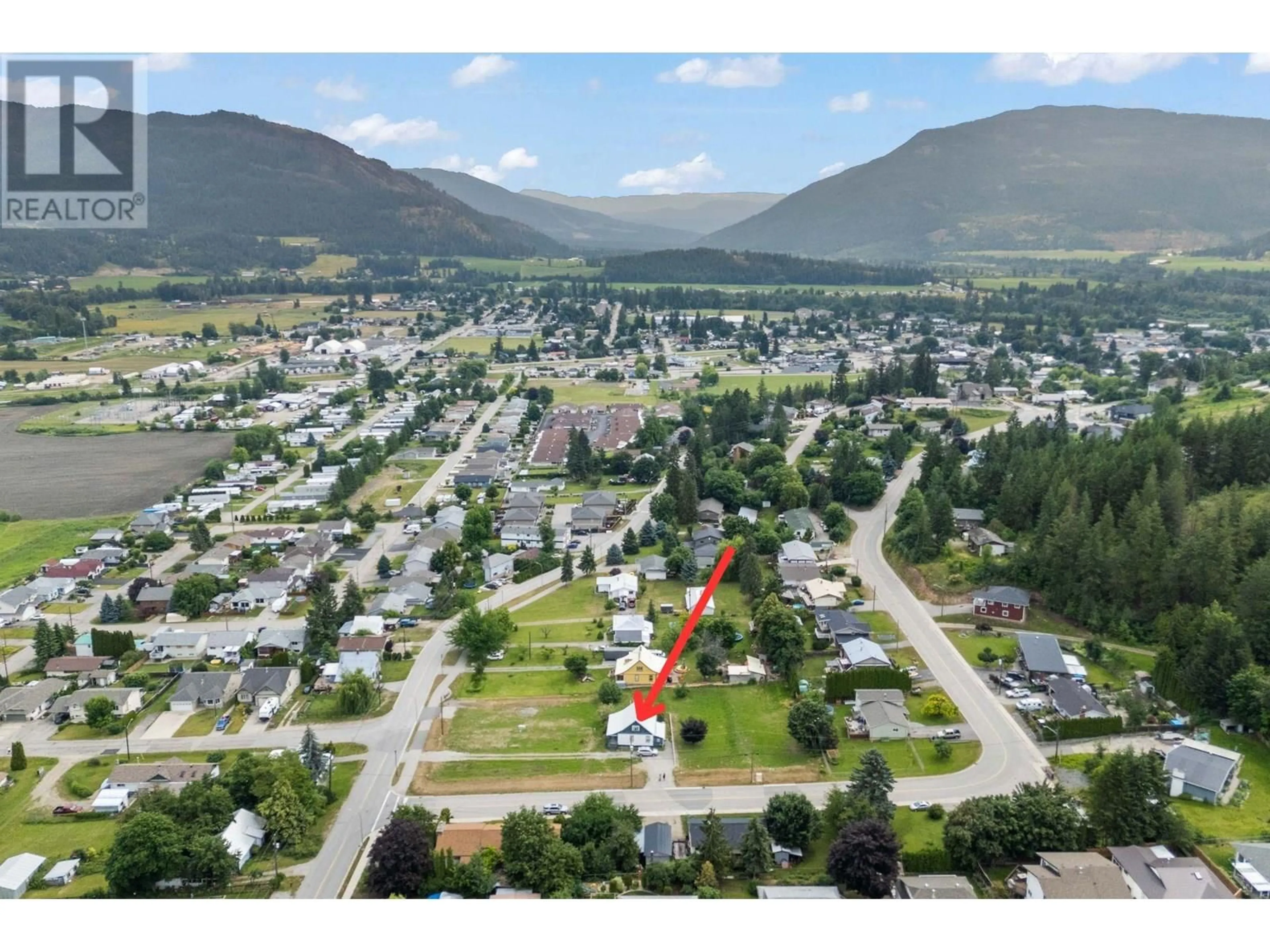A pic from outside/outdoor area/front of a property/back of a property/a pic from drone, mountain view for 186 SALMON ARM DRIVE, Enderby British Columbia V0E1V1