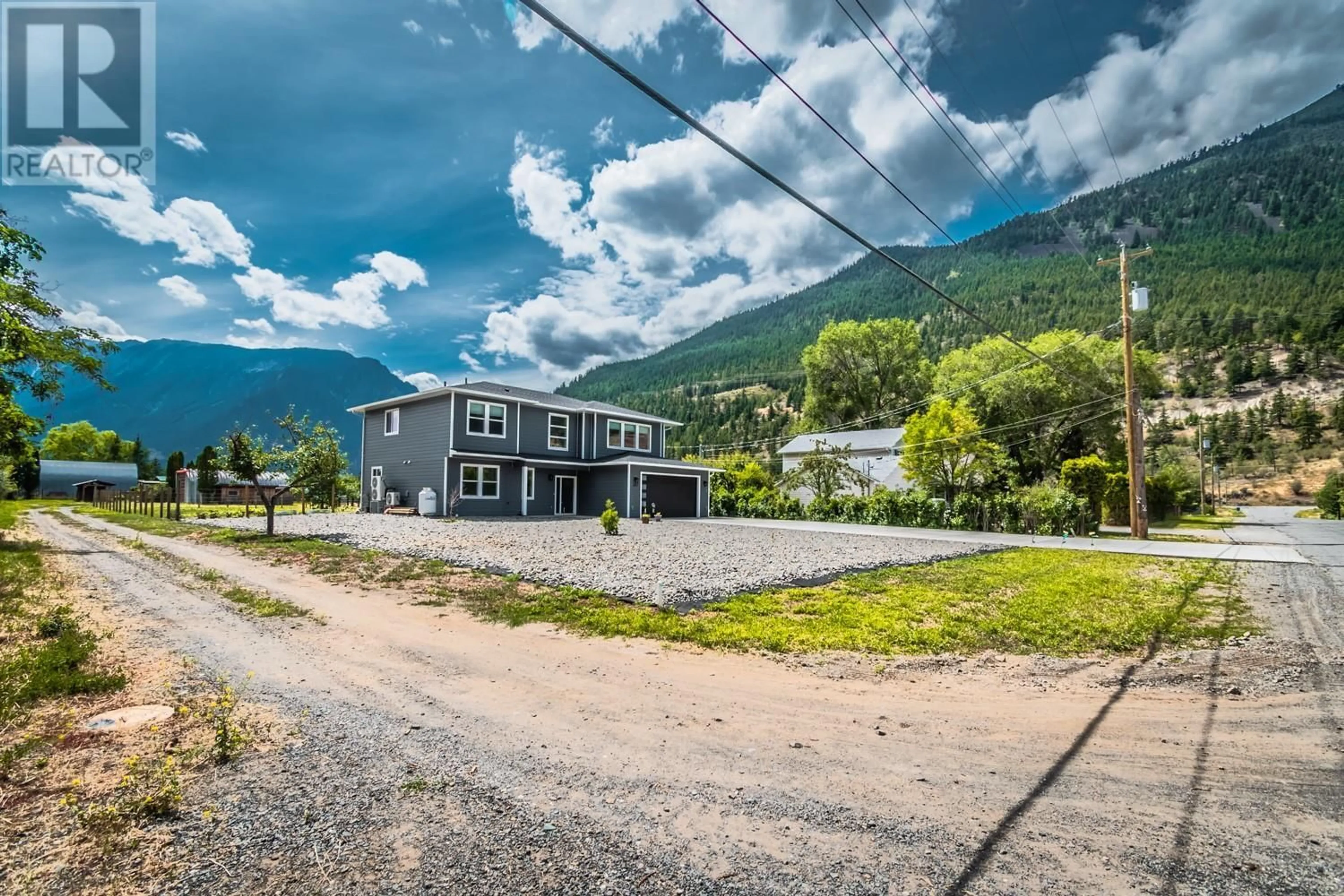 A pic from outside/outdoor area/front of a property/back of a property/a pic from drone, mountain view for 180 HOLLYWOOD CRESCENT, Lillooet British Columbia V0K1V0