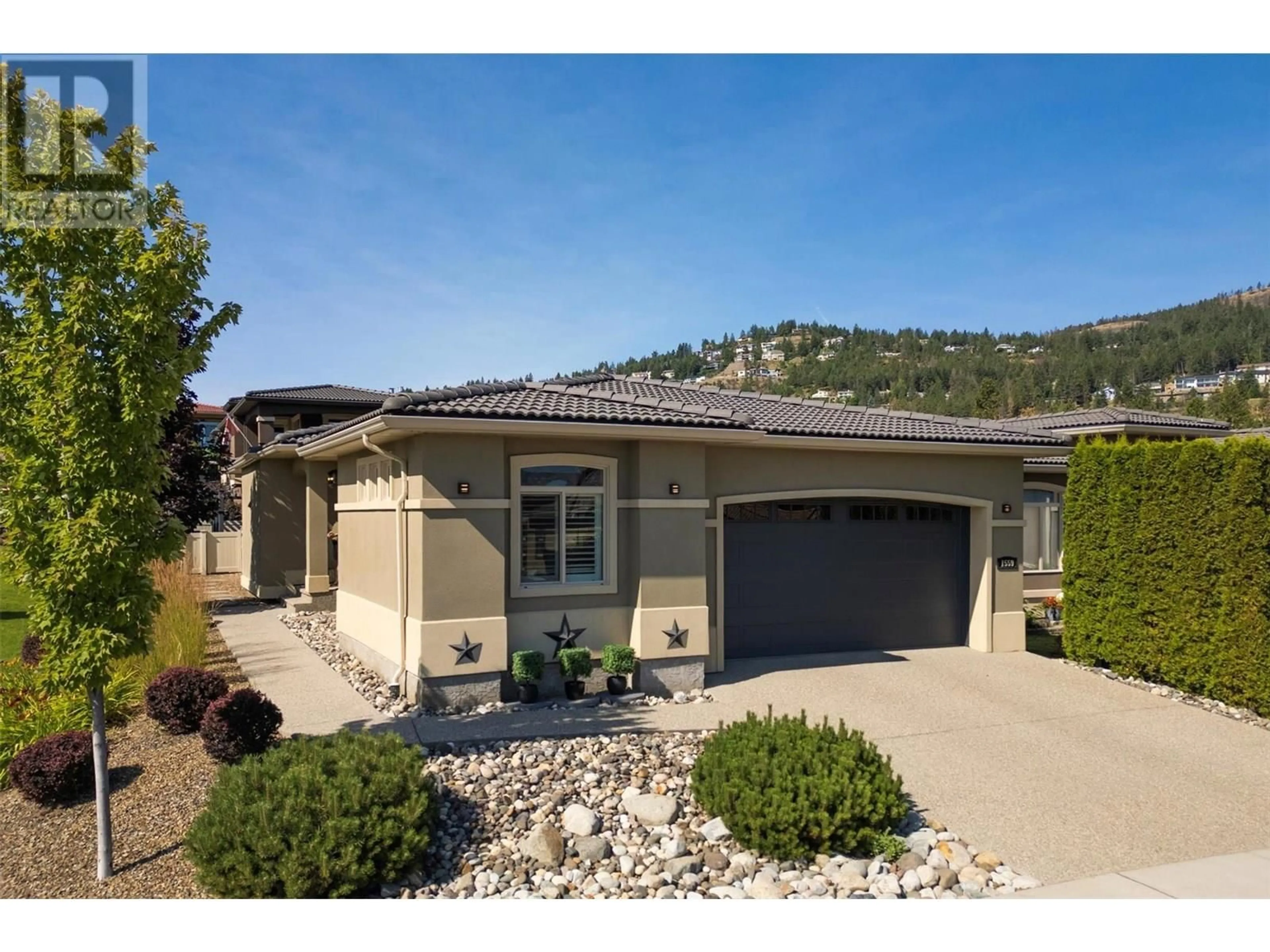 Home with vinyl exterior material, street for 1559 HARBOUR GREEN ROAD, Kelowna British Columbia V1Z4E1